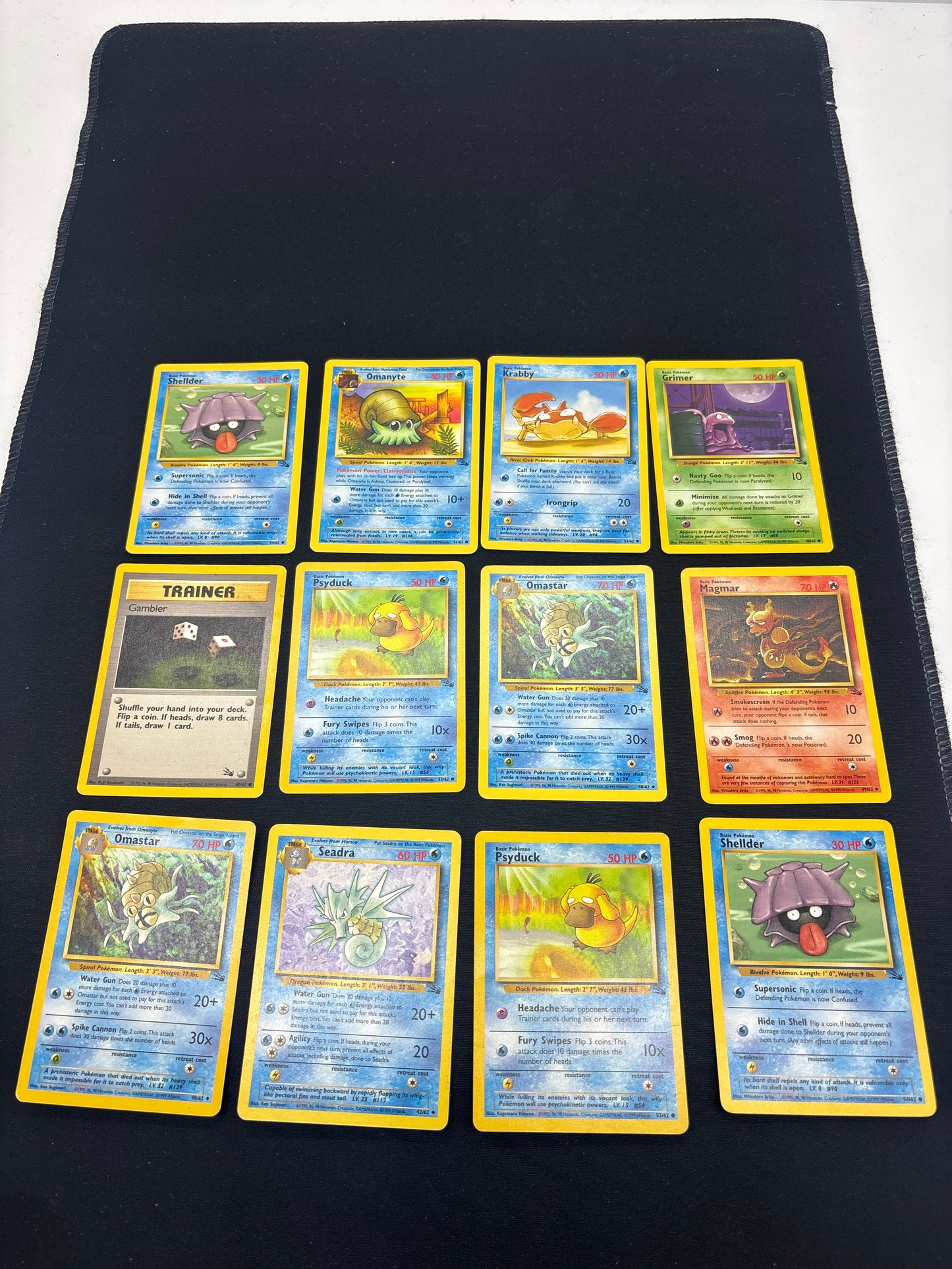 Auction Lot 111: Pokemon Cards Lot of 12 Assorted Fossil Conditions Vary