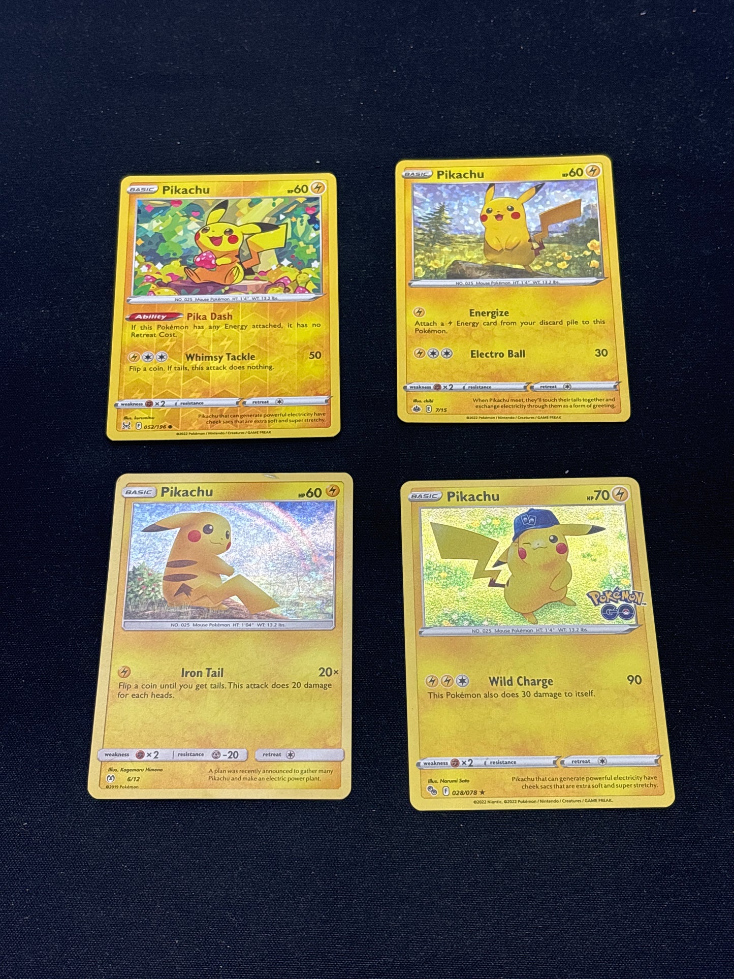 Auction Lot 18: Pokemon Cards Lot of 4 Assorted Pikachu Holos Conditions Vary