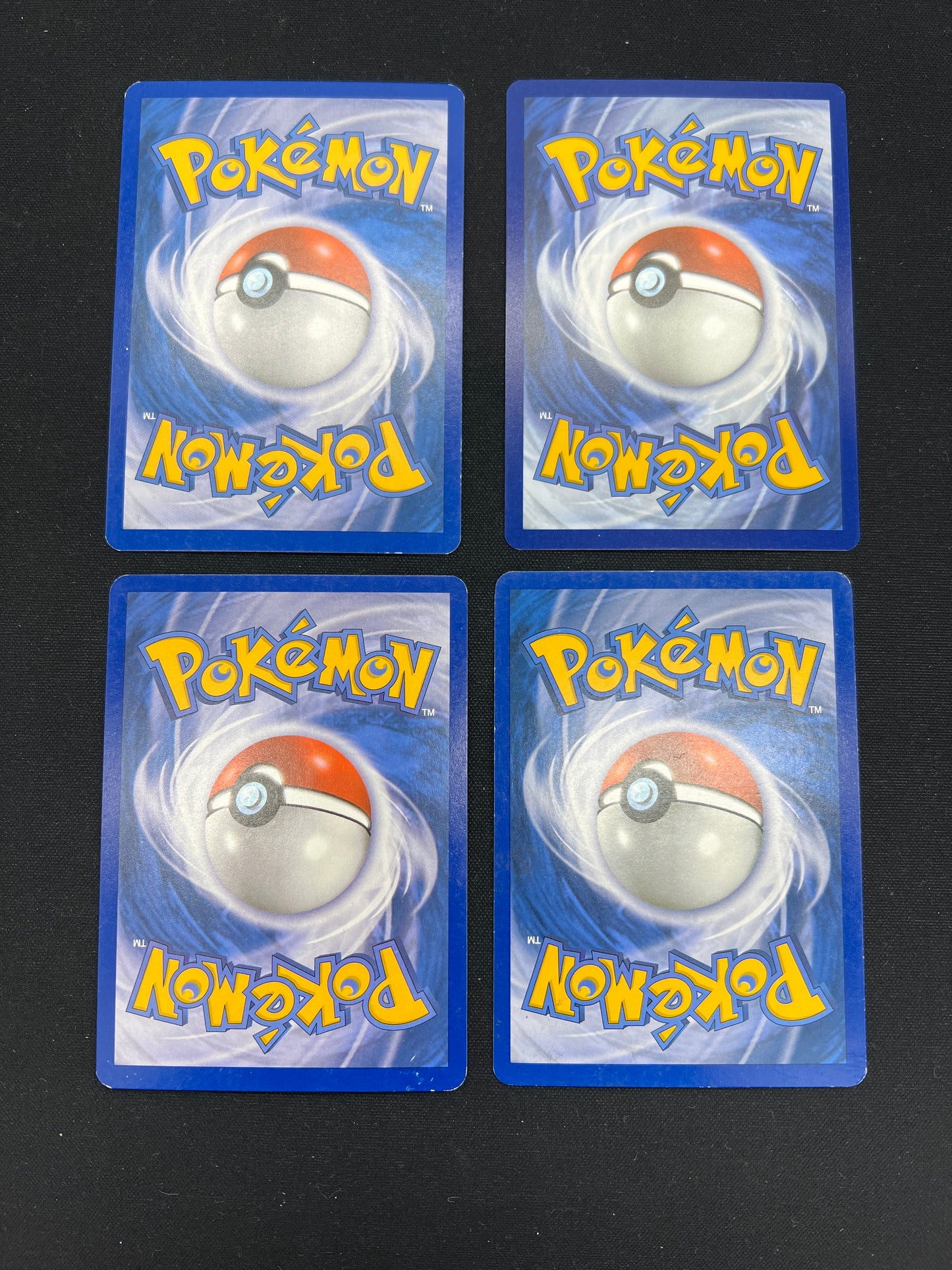 Auction Lot 28: Pokemon Cards Lot of 4 Assorted Eeveelutions Reverse Holos Conditions Vary