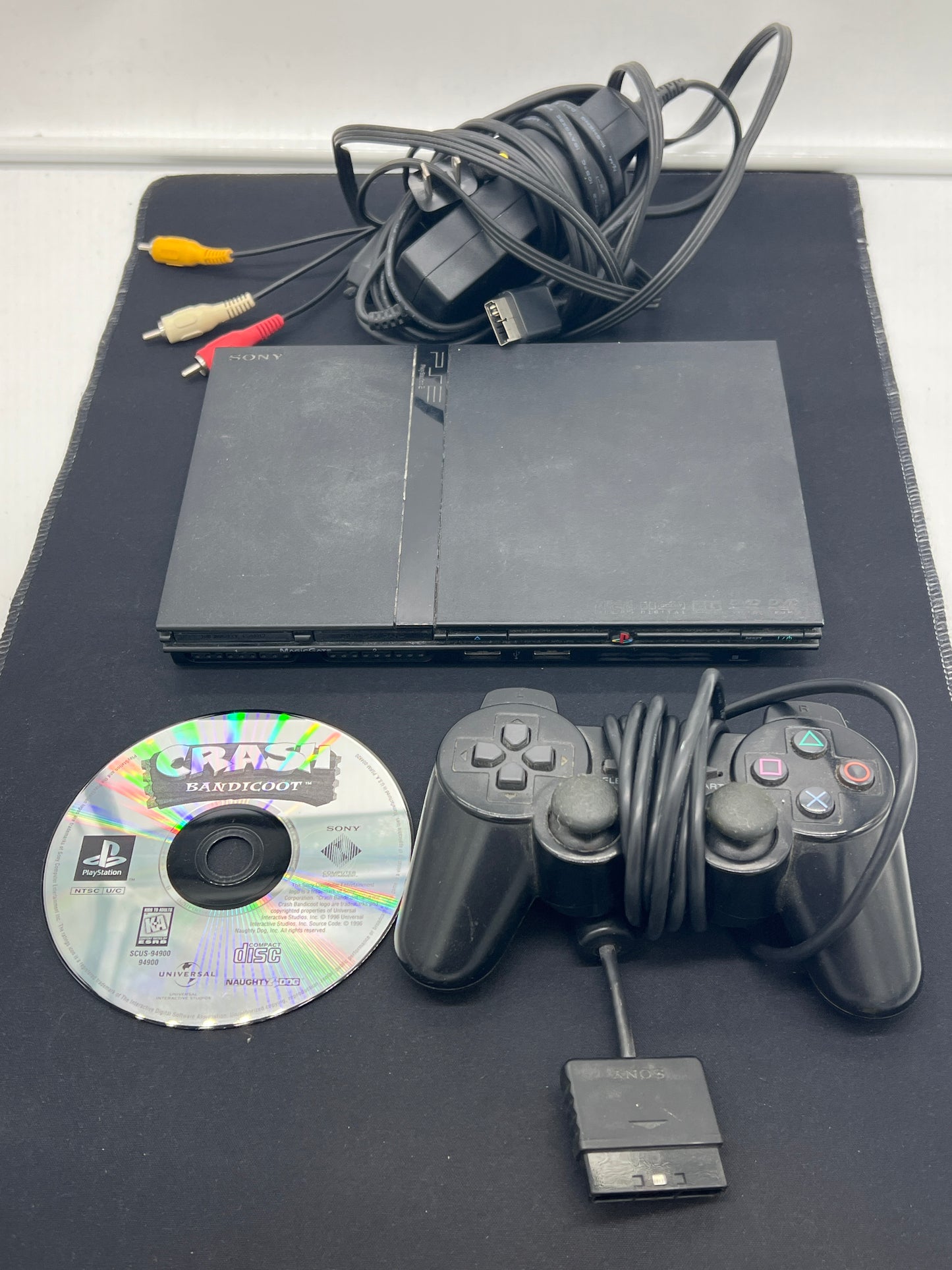 Auction Lot 140: PlayStation 2 Slim Console With Cords Controller Crash Bandicoot Video Game Untested