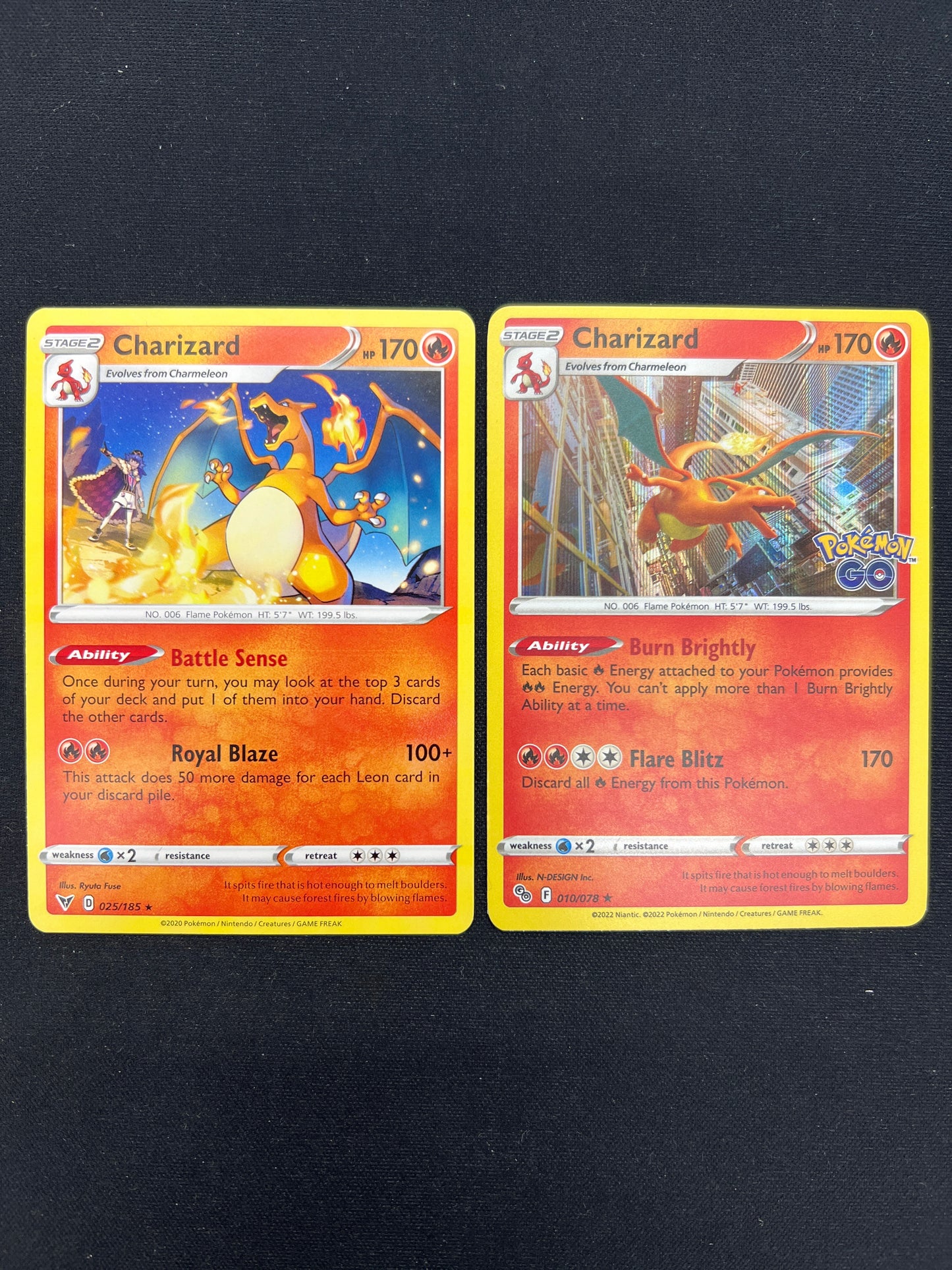 Auction Lot 464: Pokemon Cards Lot of 2 Charizard Pokemon GO & Vivid Voltage Conditions Vary