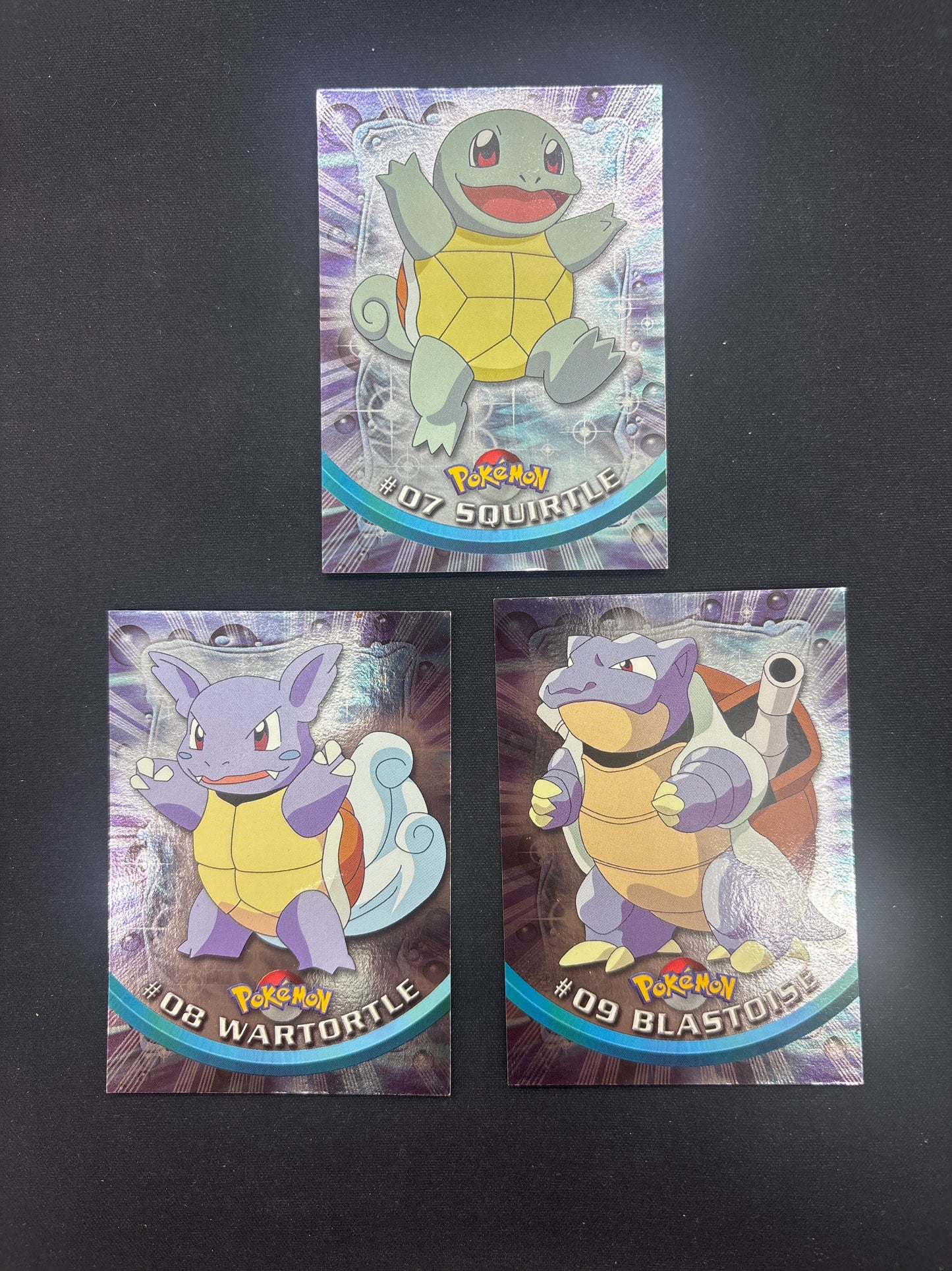 Auction Lot 71: Pokemon Card Lot of 3 Assorted Squirtle Evolution Line Topps Rainbow Foil Conditions Vary