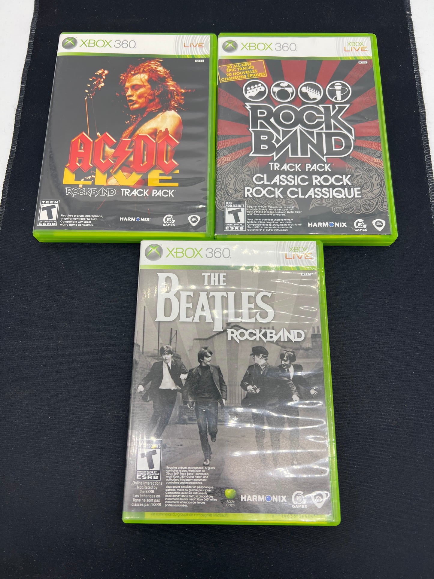 Auction Lot 215: XBOX 360 Video Game Lot of 3 Rock Band AC/DC Live Rock Band Beatles CIB