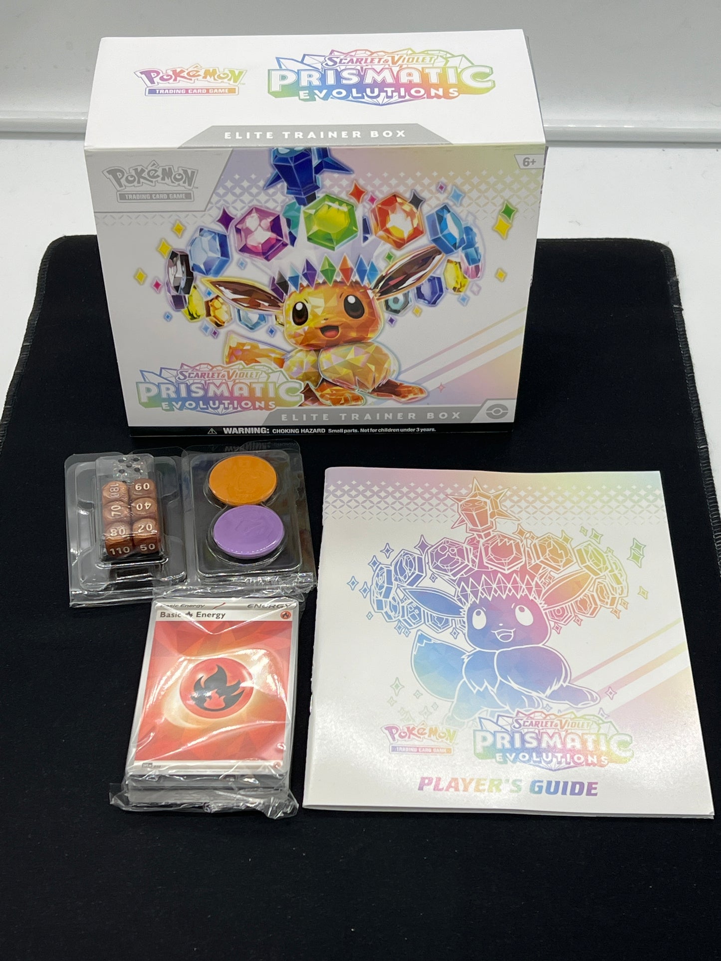 Auction Lot 152: Pokemon Prismatic Evolutions EMPTY ETB With Accessories