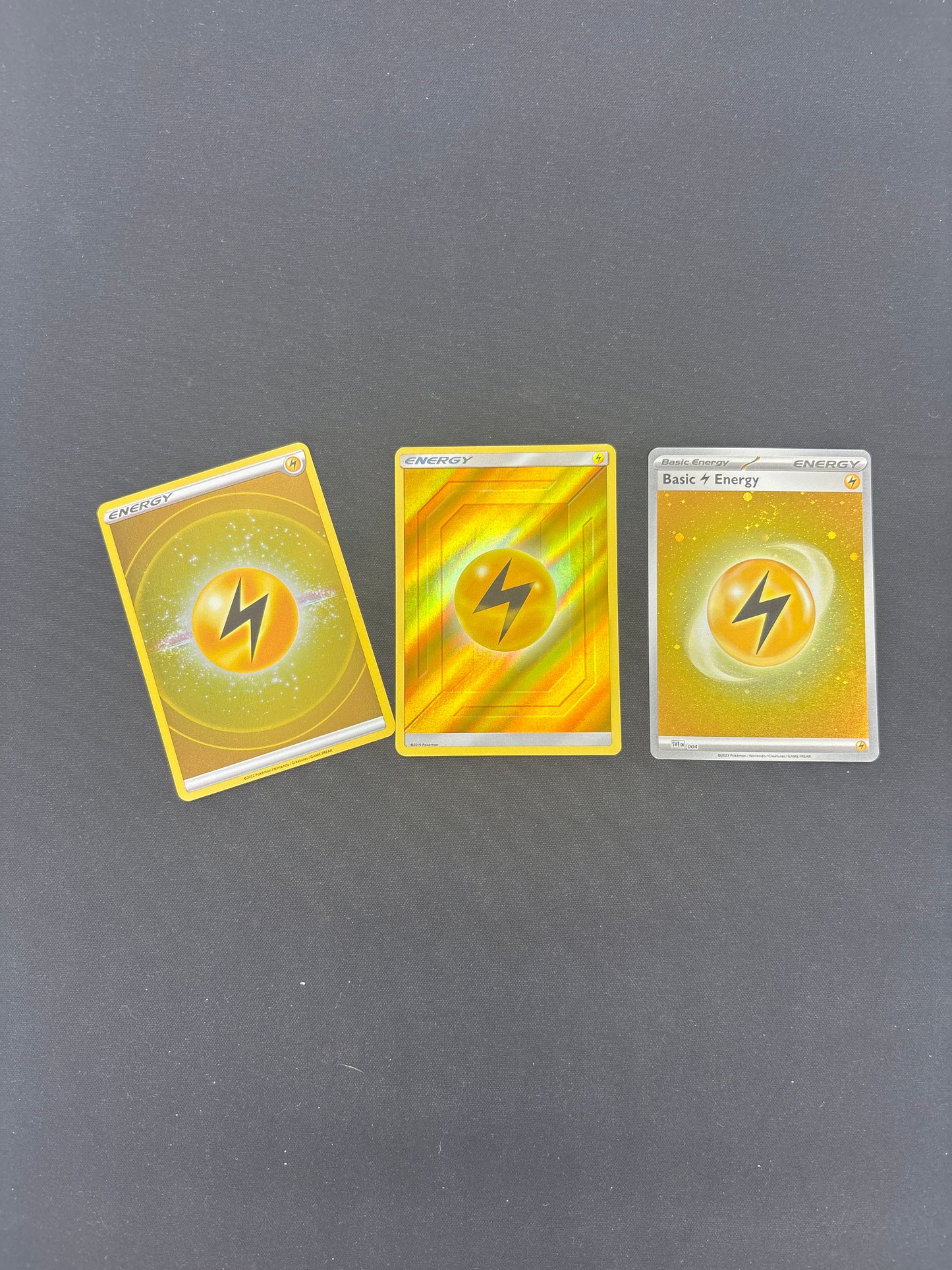 Auction Lot 249: Pokemon Lightning Holo Energy Card Lot 1 Conditions Vary