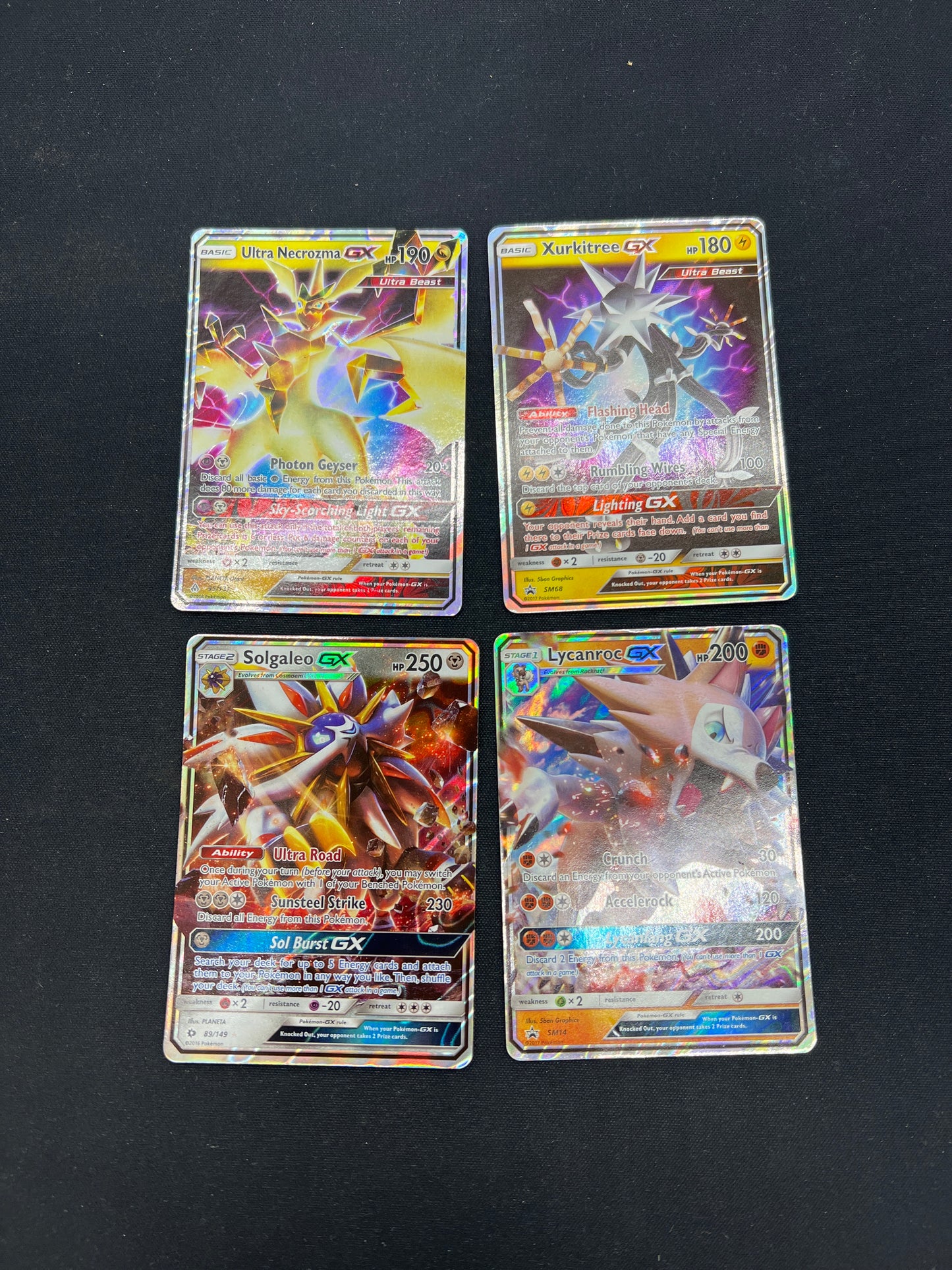 Auction Lot 75: Pokemon Cards Lot of 4 GX Full Arts Conditions Vary