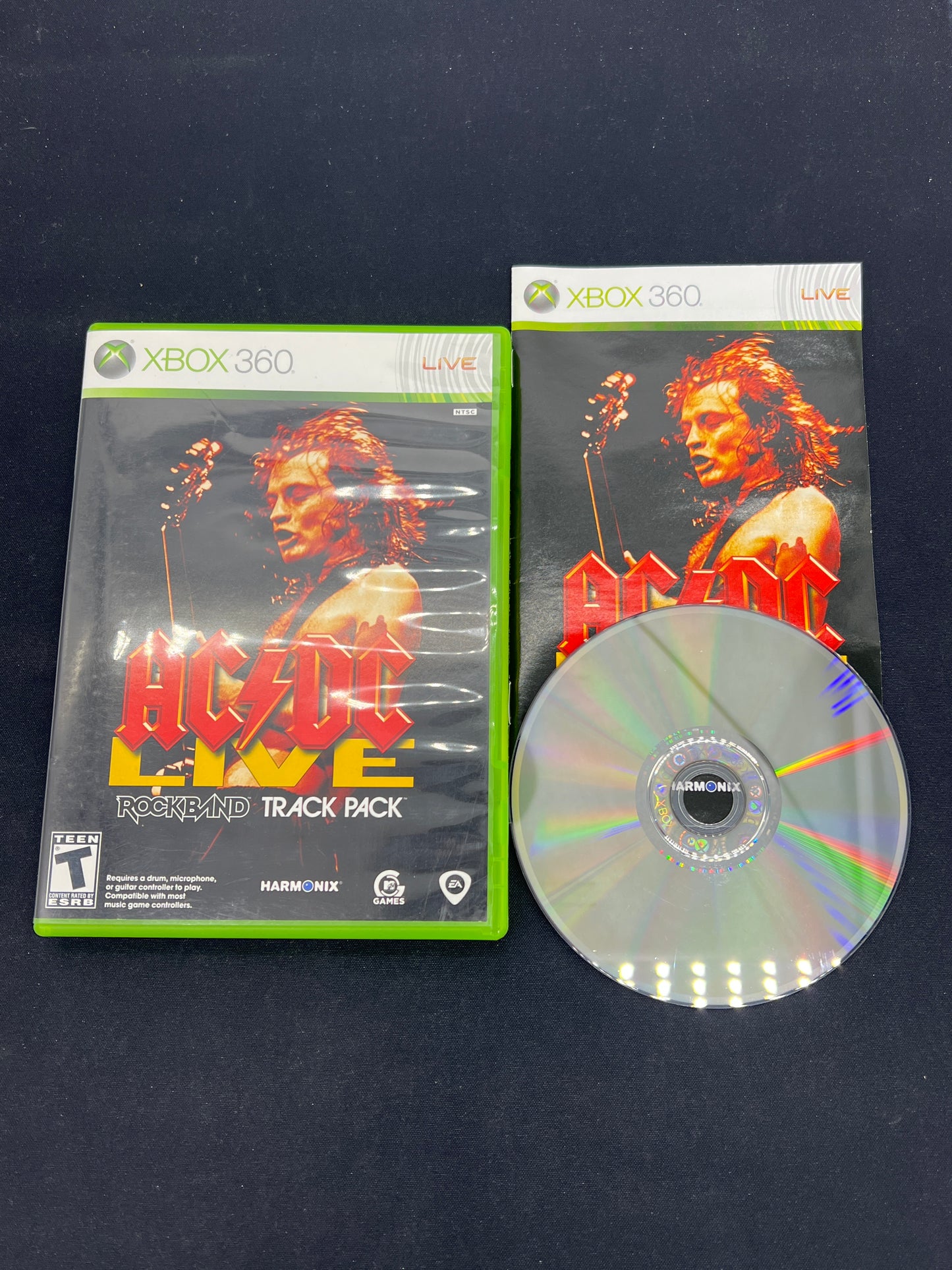 Auction Lot 215: XBOX 360 Video Game Lot of 3 Rock Band AC/DC Live Rock Band Beatles CIB