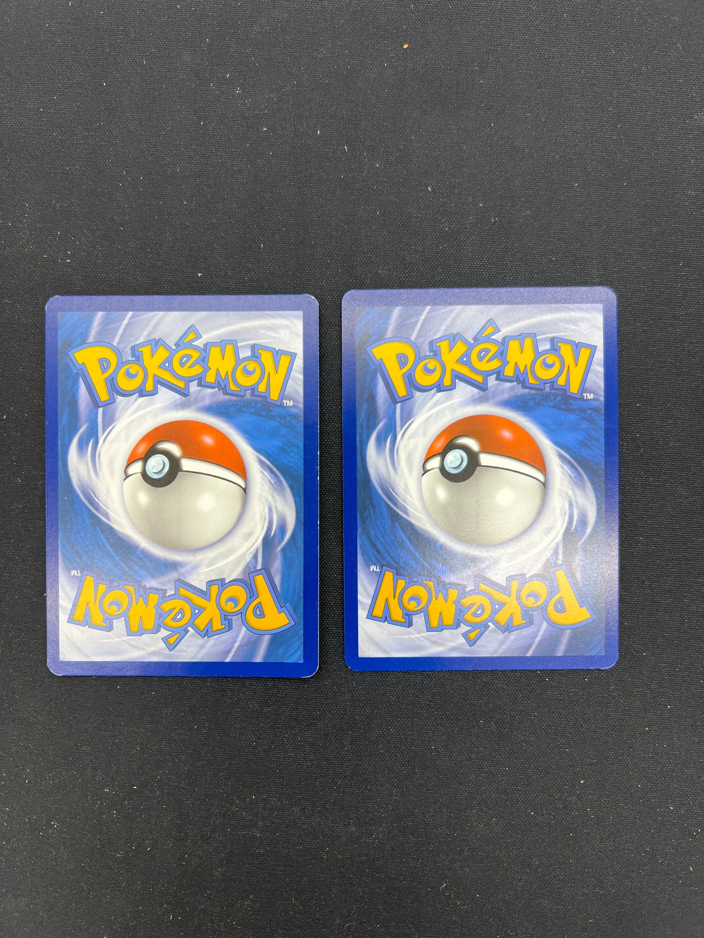 Auction Lot 121: Pokemon Cards Lot of 2 Rapidash Stamped Holo and Lillie's Pearl Cosmo Holo Conditions Vary