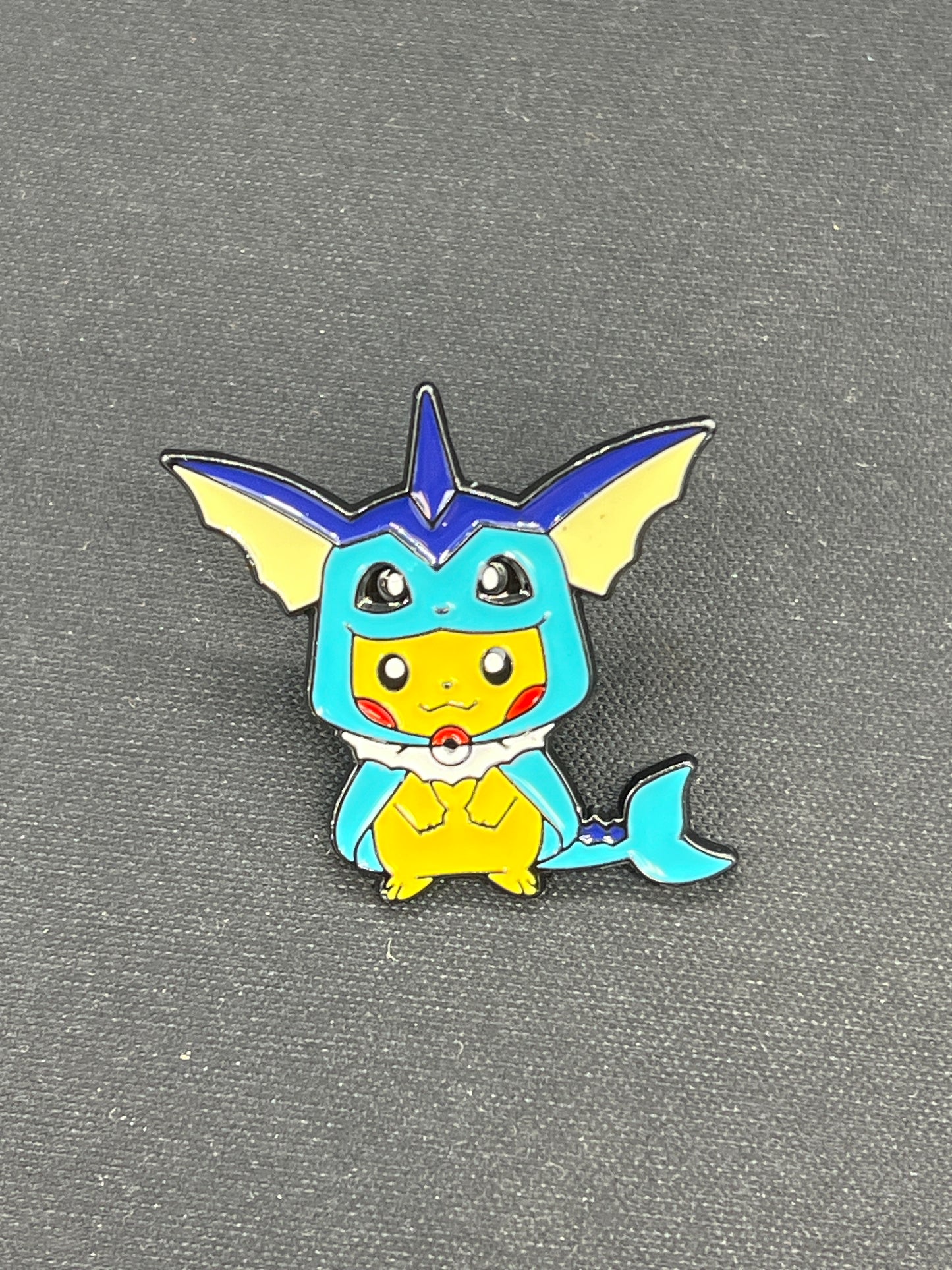 Auction Lot 175: Pokemon Pin Vaporeon Pikachu Poncho
