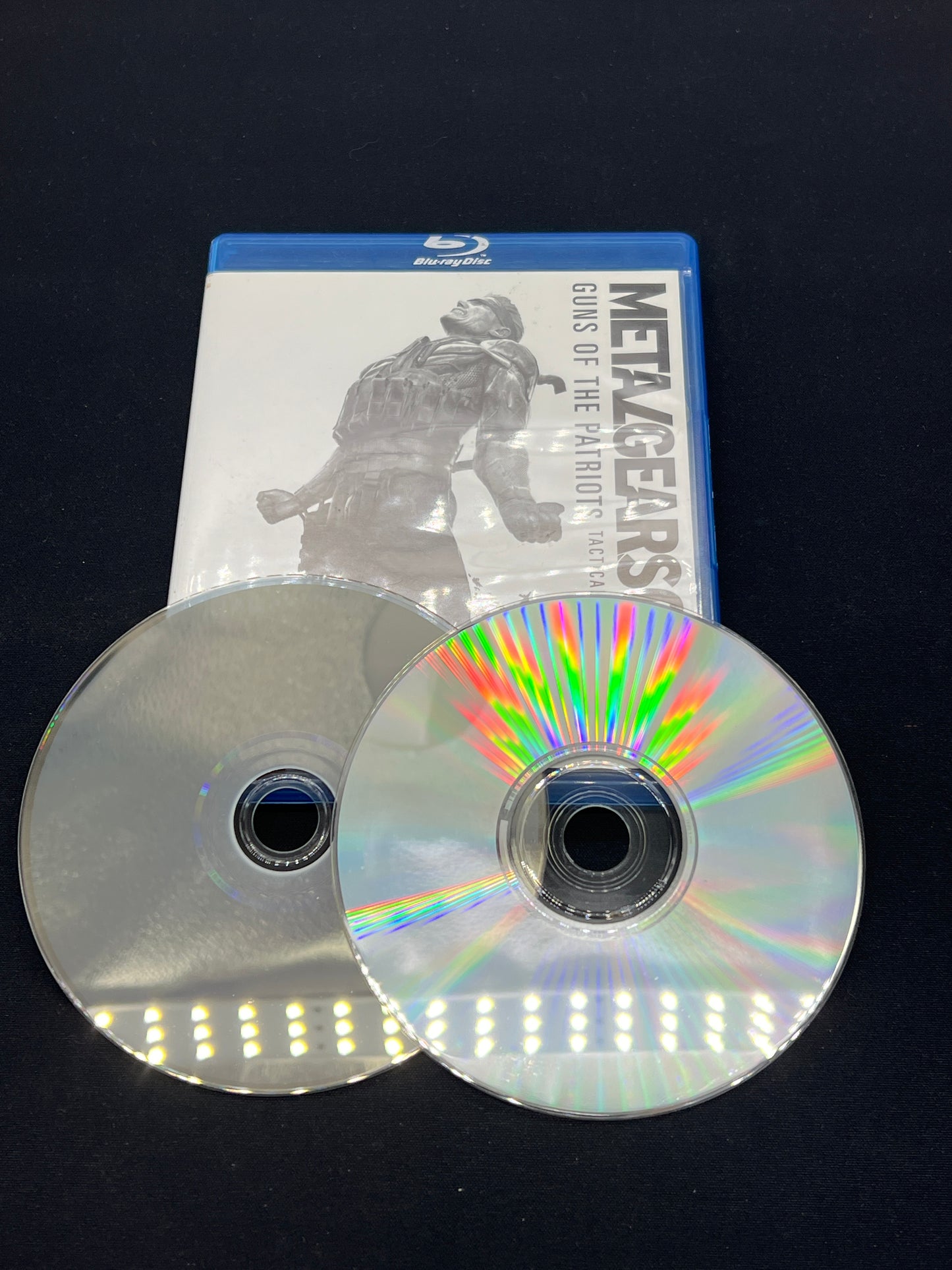 Auction Lot 144: Metal Gear Solid 4: Guns of the Patriot Limited Edition Bonus Disc and Soundtrack