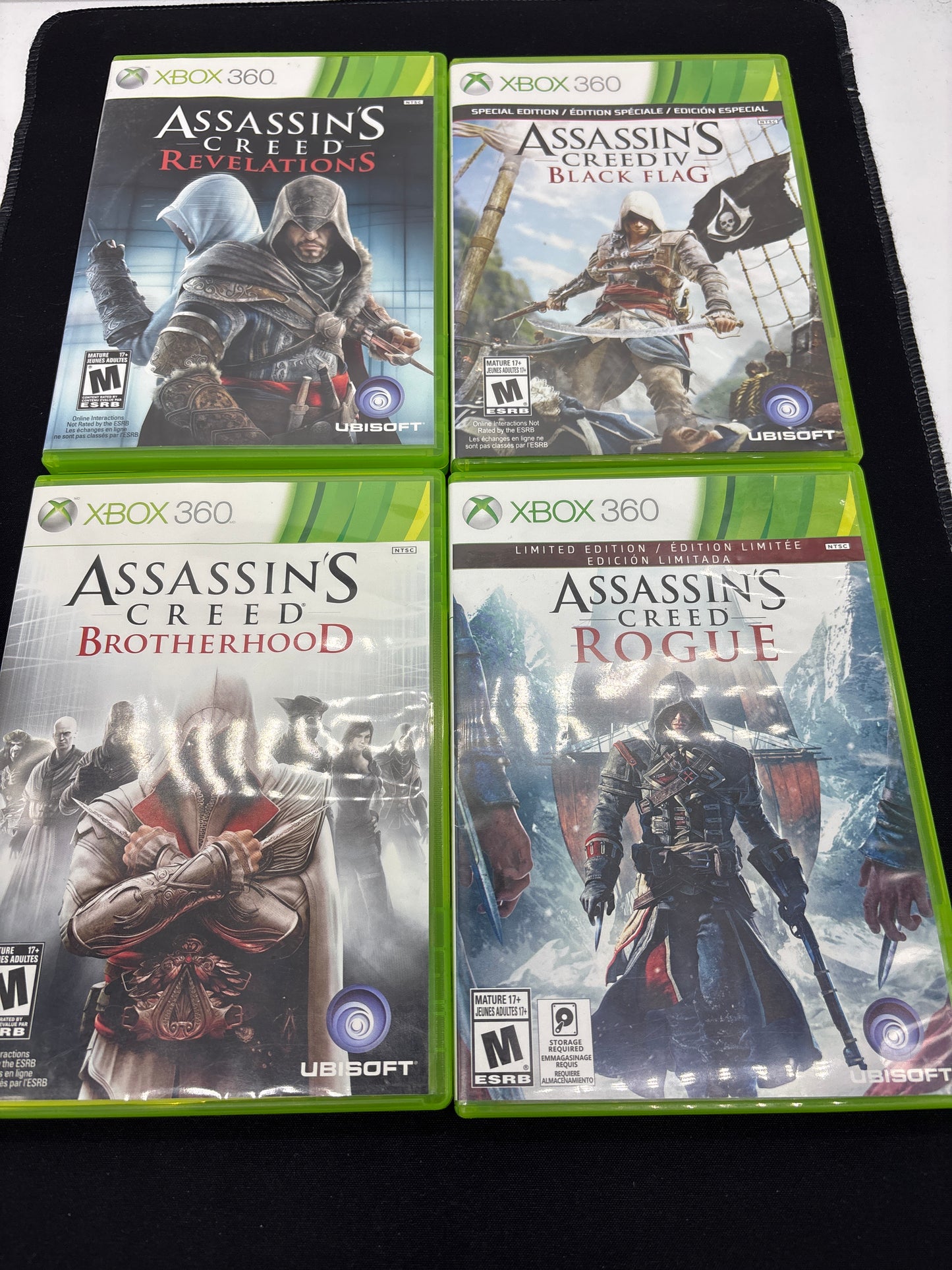 Auction Lot 103: XBOX 360 Video Game Lot of 4 Assassin's Creed Brotherhood Revelations Black Flag Rogue