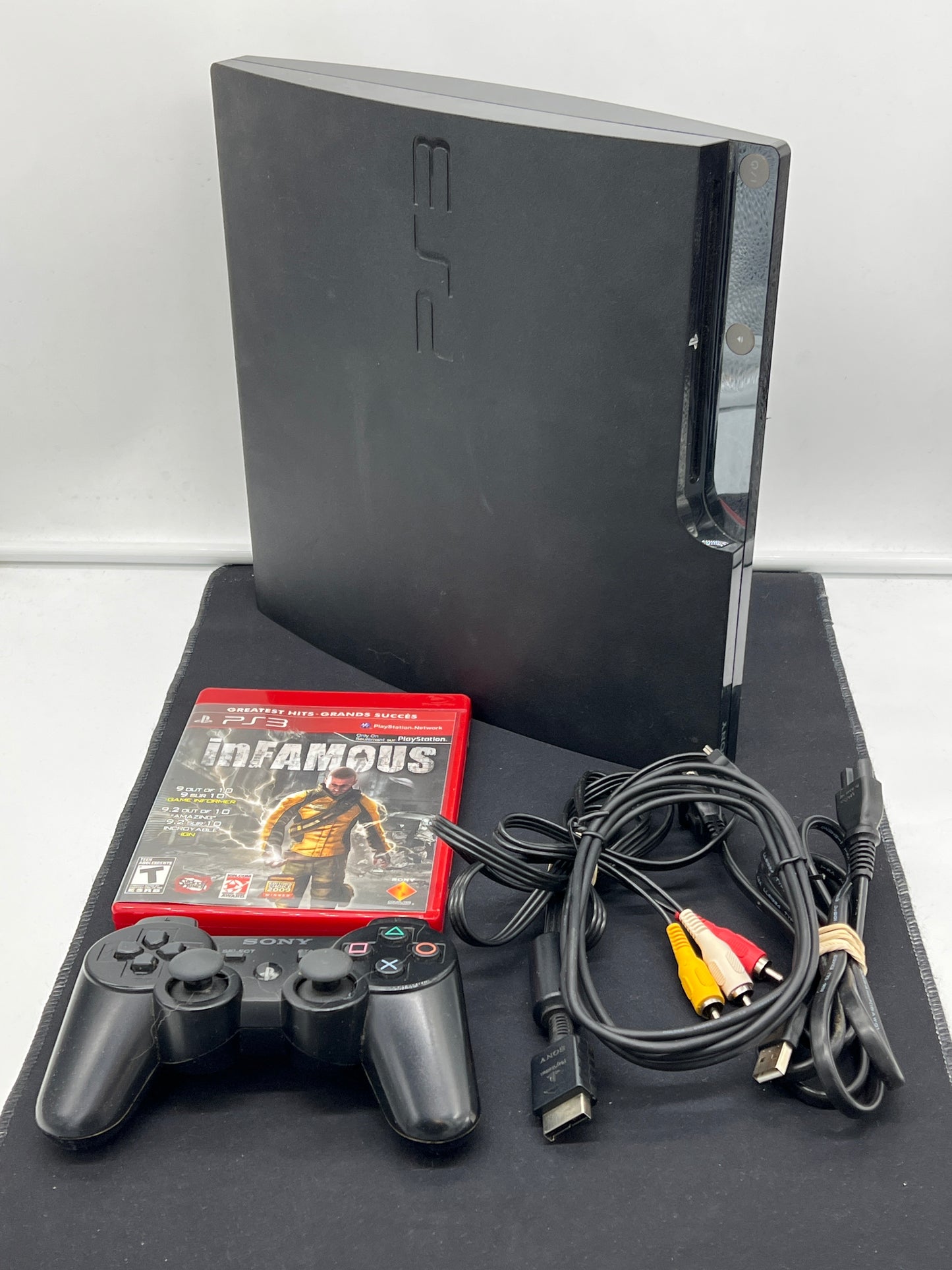 Auction Lot 28: PS3 Model CECH-2501A with Infamous