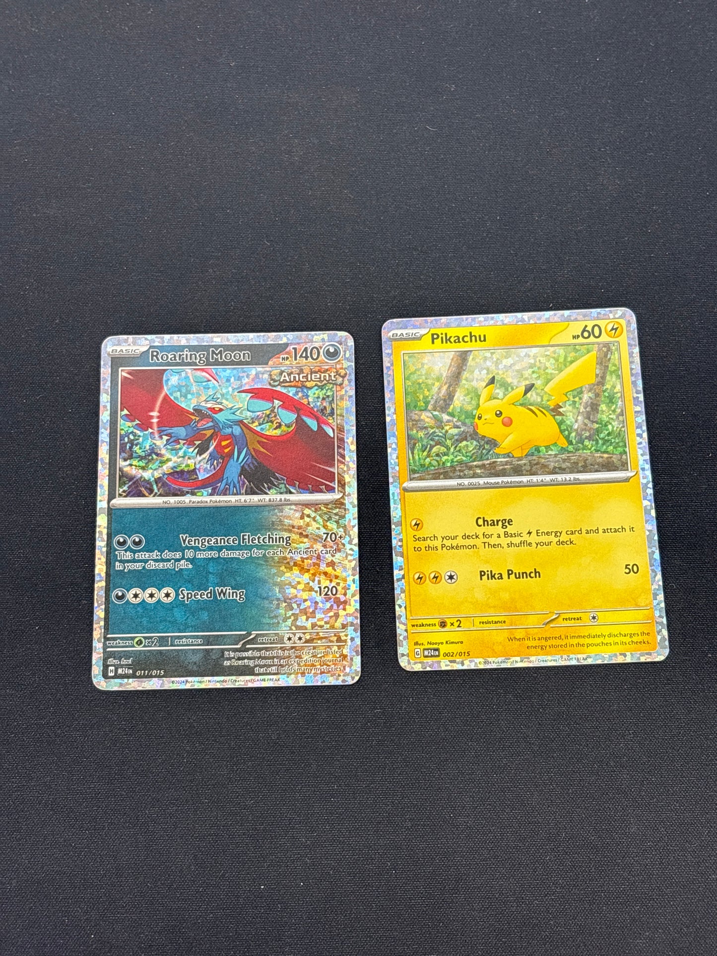 Auction Lot 56: Pokemon 2 Card Lot Roaring Moon & Pikachu McDonalds Promo Conditions Vary