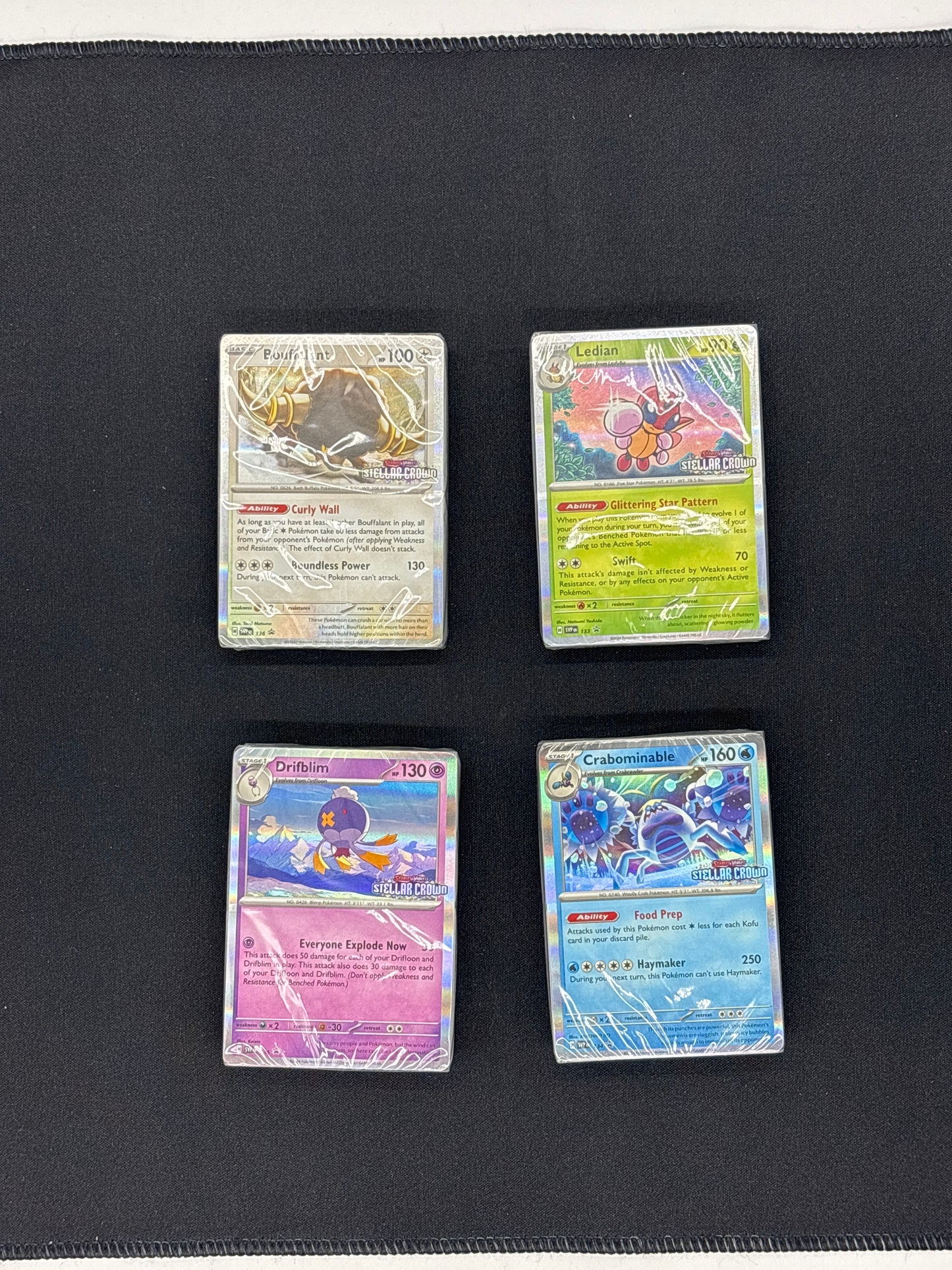 Auction Lot 25: Pokemon Stellar Crown Build and Battle Stamped Deck Complete Set