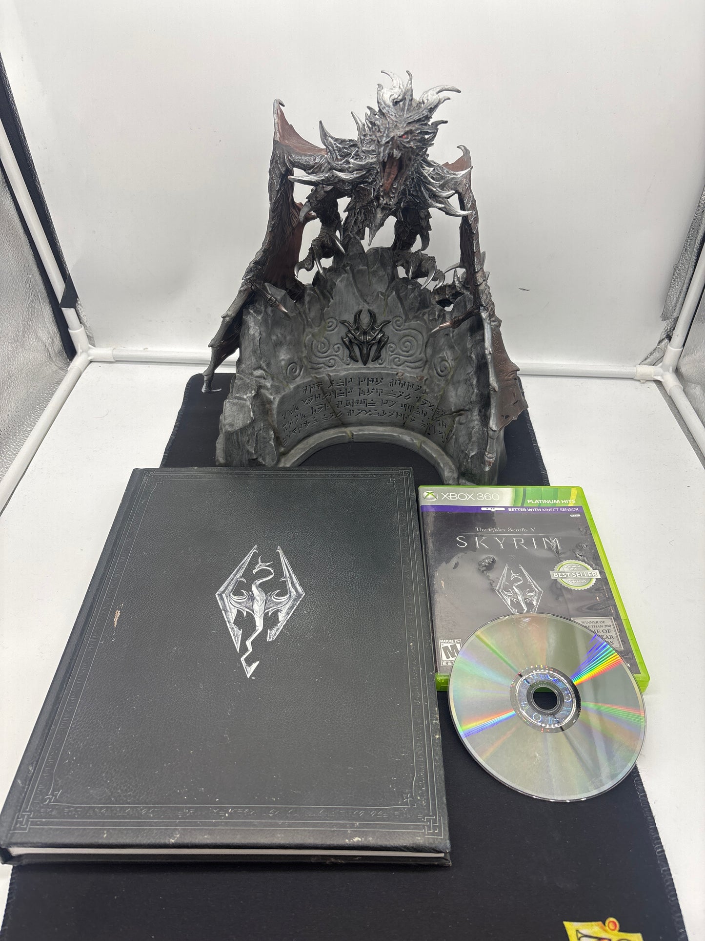 Auction Lot 5: XBOX 360 Game Elder Scrolls V Skyrim with Collector's Edition Statue and Book