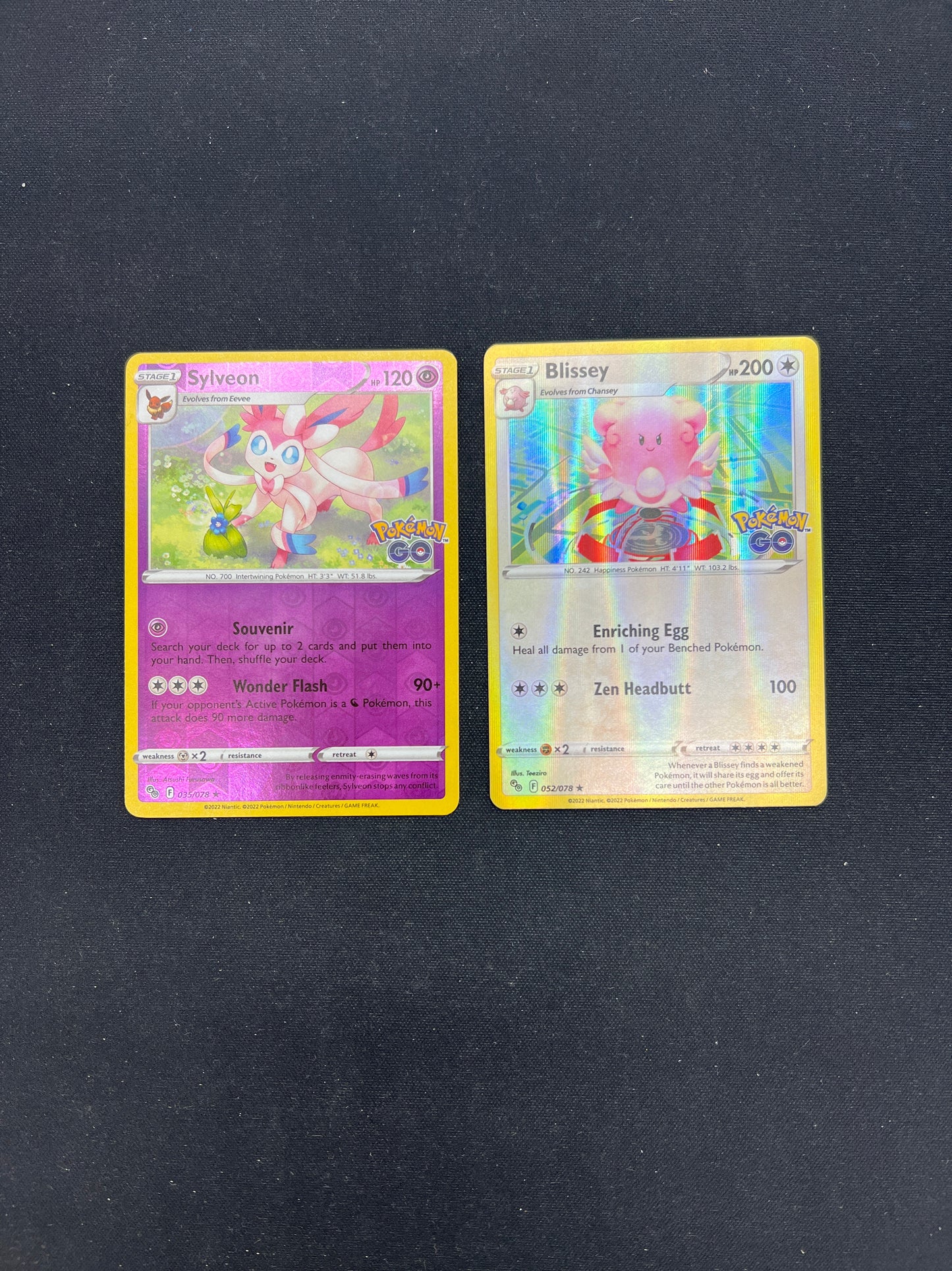 Auction Lot 295: Pokemon Cards Sylveon & Blissey Holos Stamped Pokemon GO Conditions Vary