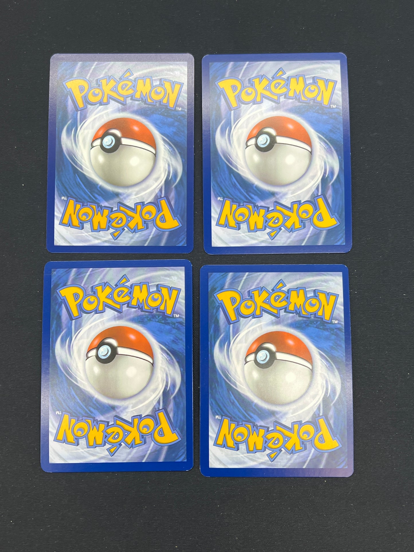 Auction Lot 335: Pokemon Cards Lot of 4 Assorted Pokeball Pattern Prismatic Evolutions Conditions Vary