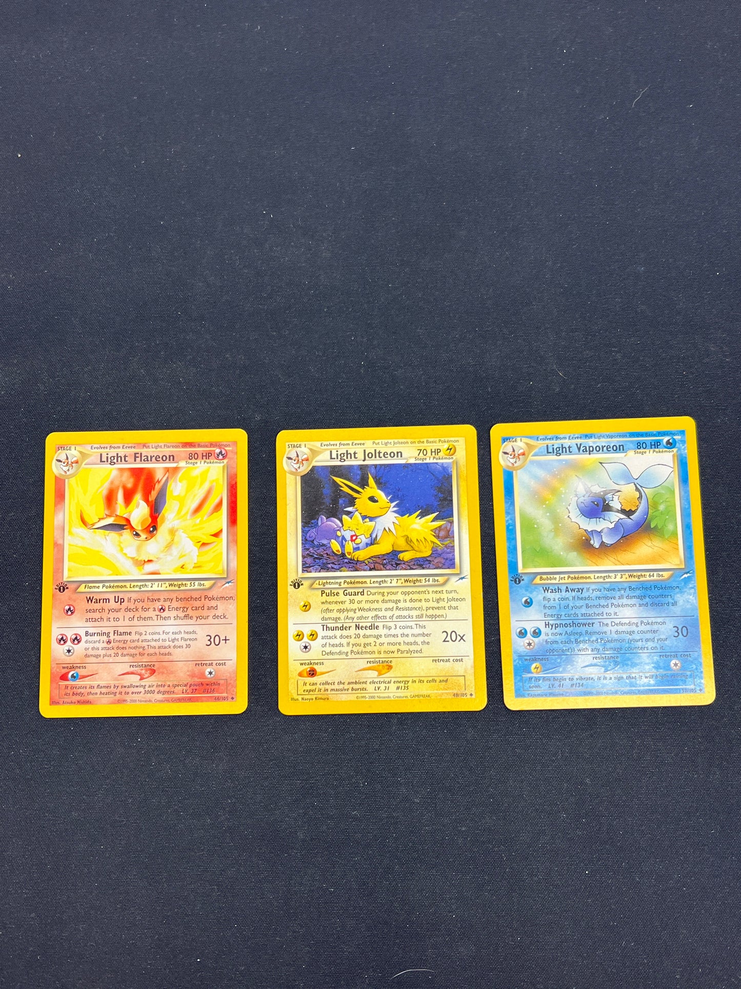 Auction Lot 4: Pokemon Cards Light Flareon Jolteon Vaporeon 1st Edition Neo Destiny Conditions Vary