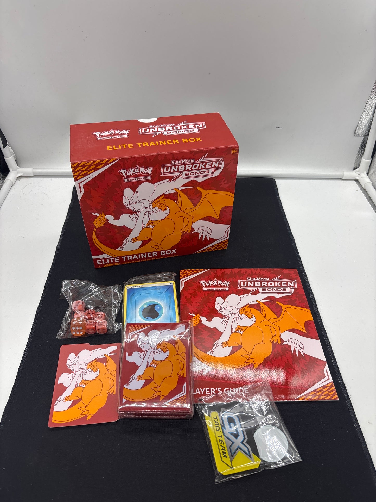 Auction Lot 221: Pokemon Unbroken Bonds ETB Empty Box With Accessories