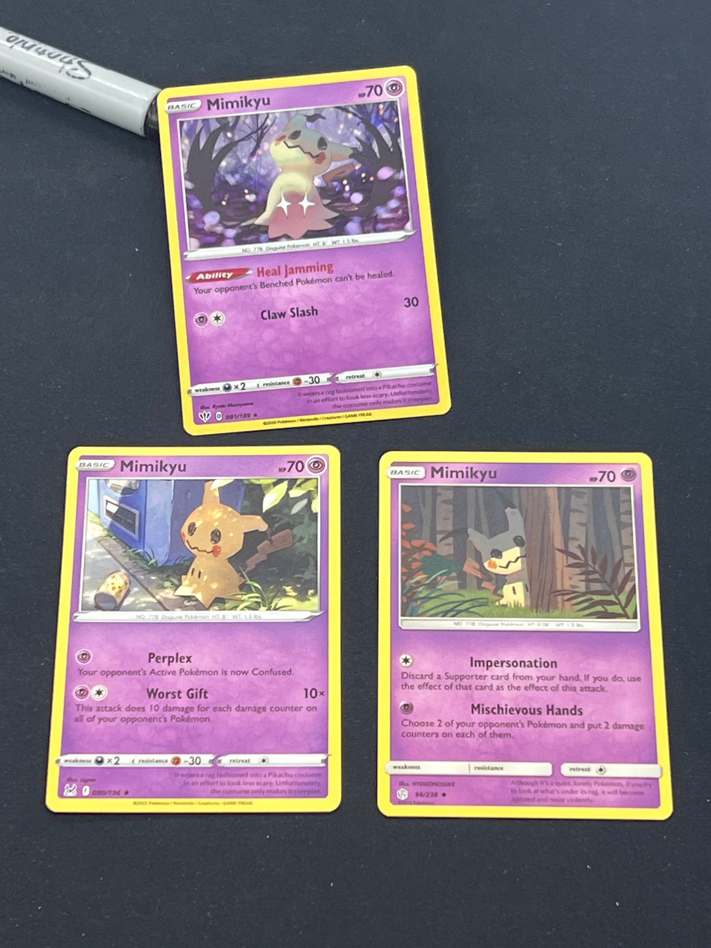 Auction Lot 453: Pokémon Cards Lot of 3 Mimikyu Cosmo Holo and Non Holo Conditions Vary