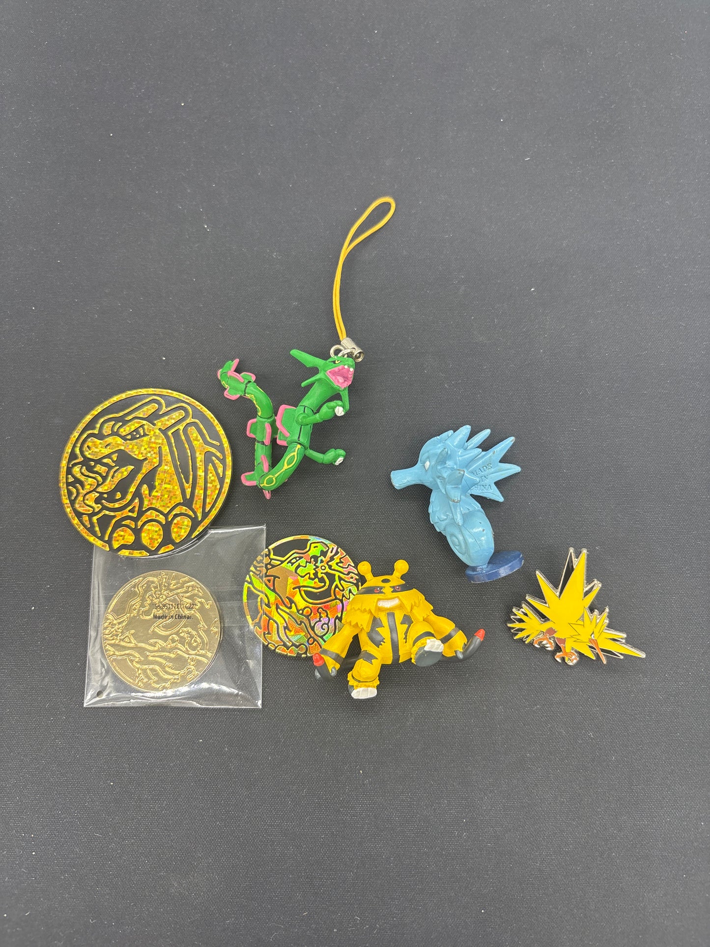 Auction Lot 77: Pokemon Pins Coins and Figures Lot 2