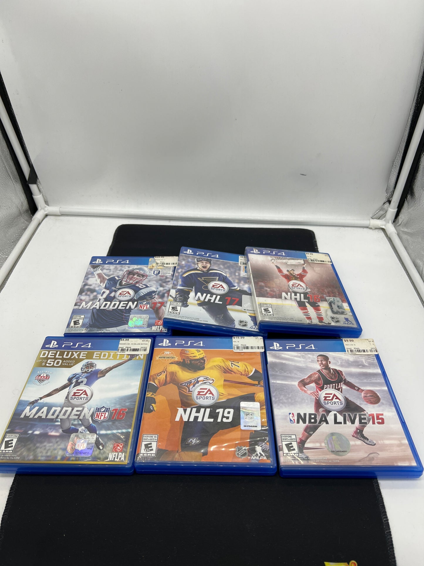 Auction Lot 144: PS4 Video Game Lot of 6 Madden 16 17 NHL 16 17 19 NBA LIVE 15