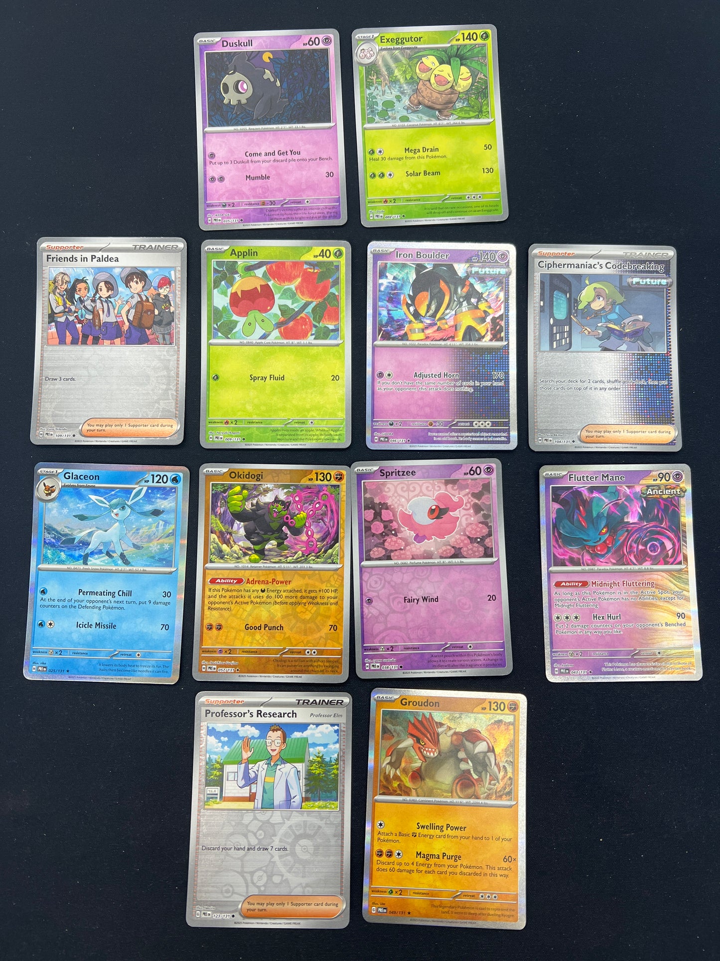 Auction Lot 304: Pokemon Cards Lot of 12 Assorted Reverse Holos Prismatic Evolutions Conditions Vary