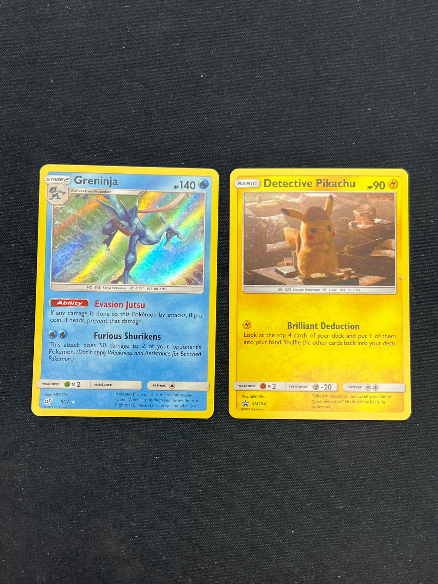 Auction Lot 400: Pokemon Cards Detective Pikachu Promo and Greninja Holo Conditions Vary