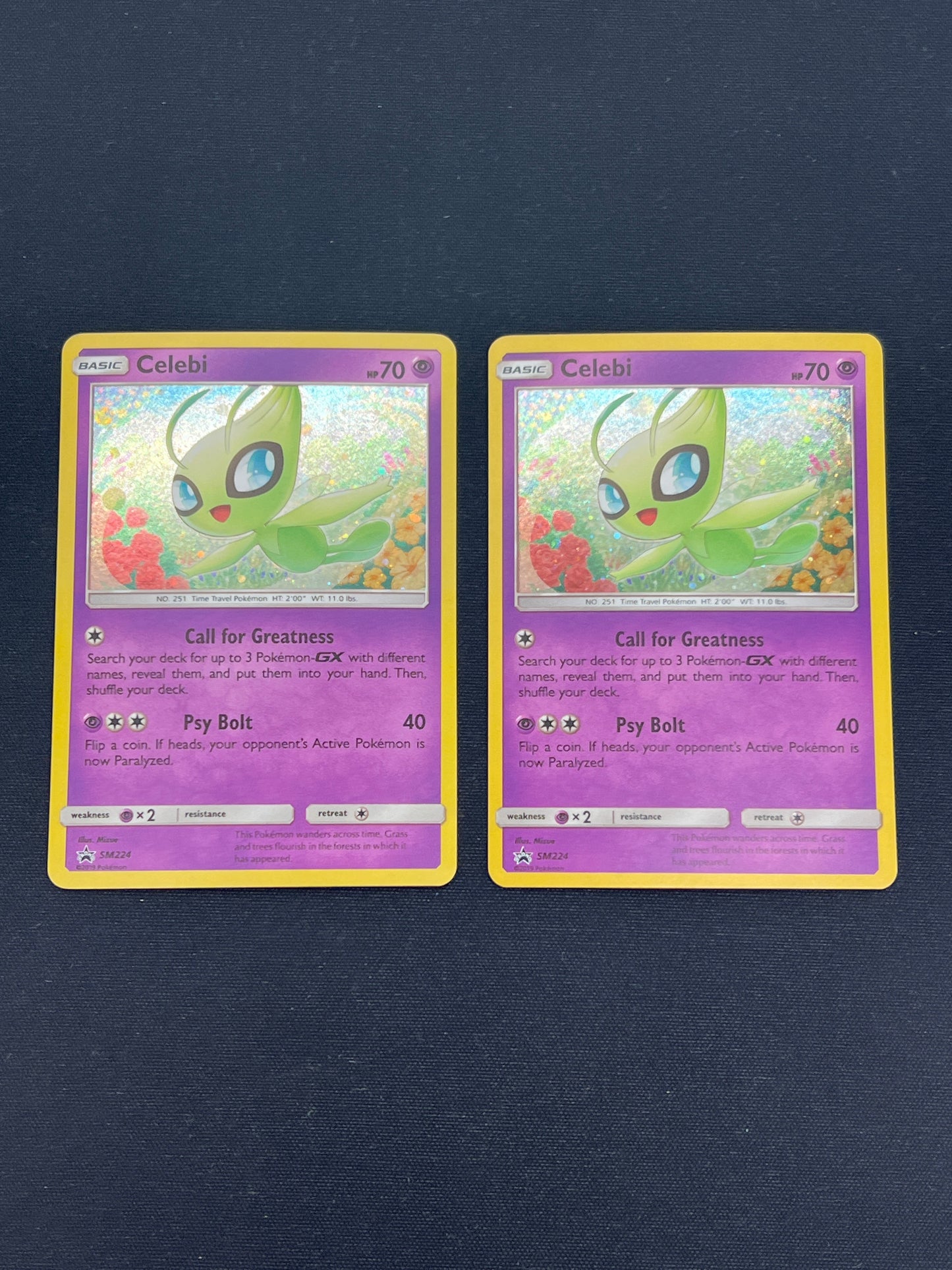 Auction Lot 220: Pokemon Cards Lot of 2 Celebi SM224 Cosmo Holo Promos Conditions Vary