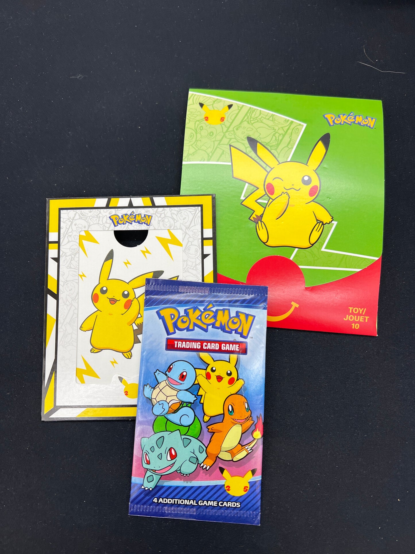 Auction Lot 279: Pokemon Cards McDonalds 25th Anniversary Promo Pack With Accessories