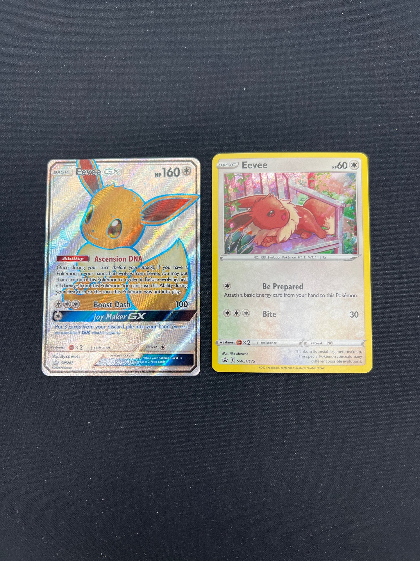 Auction Lot 421: Pokemon Cards Lot of 2 Eevee Full Art & Cosmo Holo Promos Conditions Vary