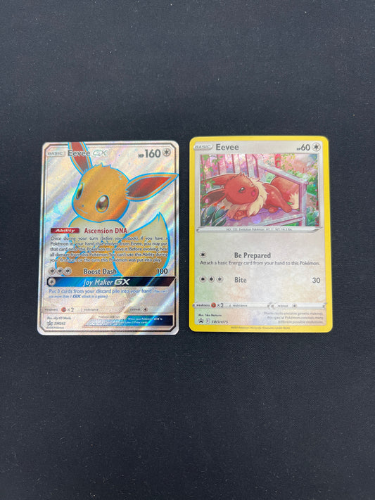 Auction Lot 421: Pokemon Cards Lot of 2 Eevee Full Art & Cosmo Holo Promos Conditions Vary