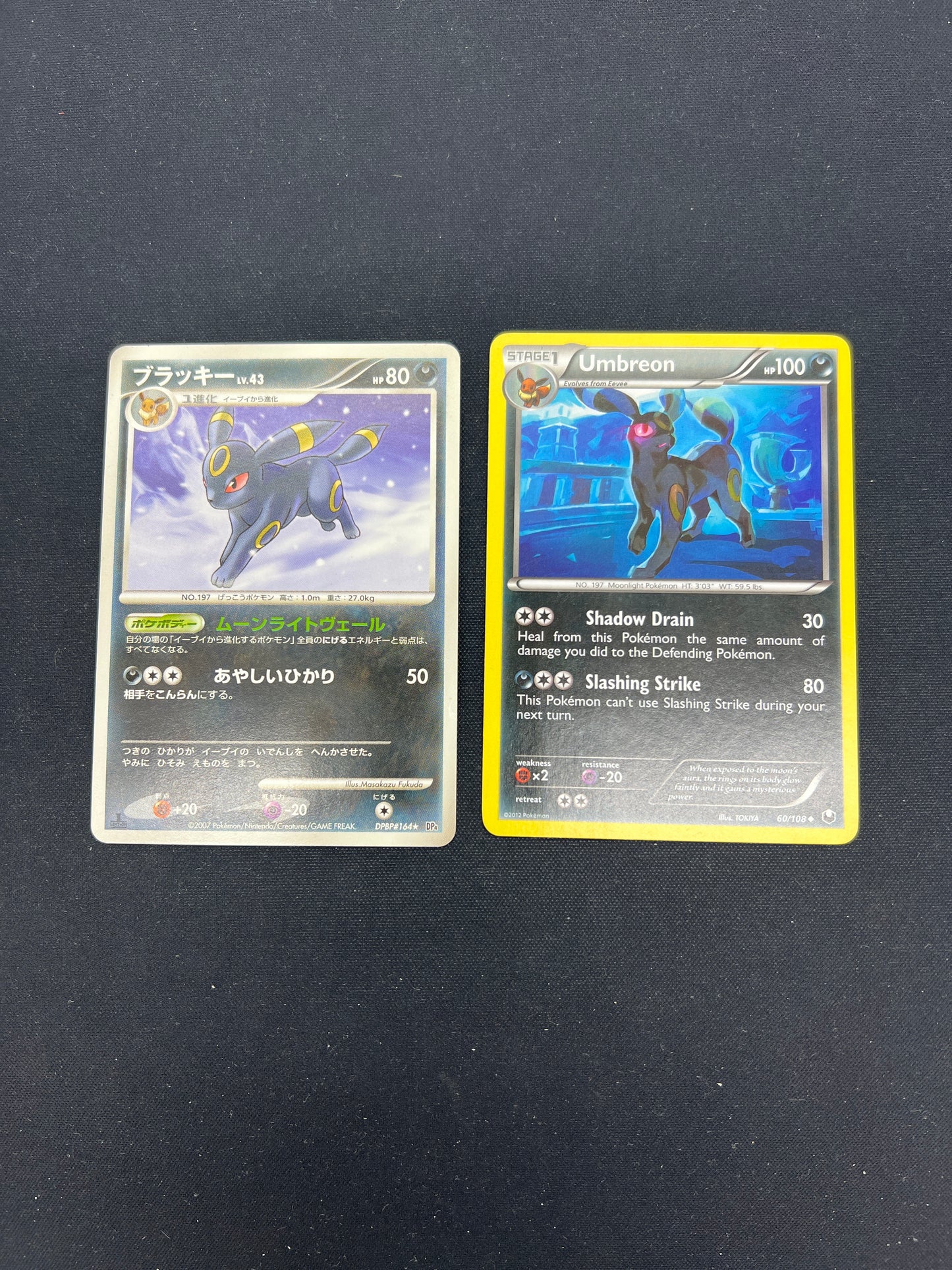 Auction Lot 117: Pokemon Cards Lot of 2 Umbreon Japanese Holo and Non Holo Condition Vary