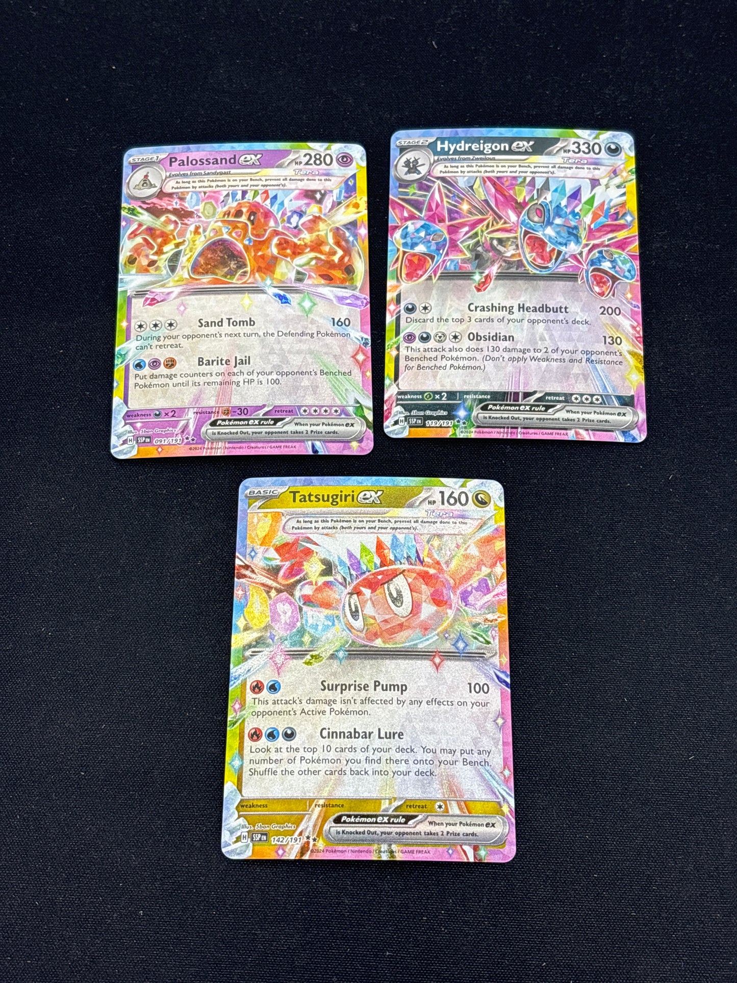 Auction Lot 77: Pokemon Cards Assorted Lot of 3 Surging Sparks Tera EXs Conditions Vary