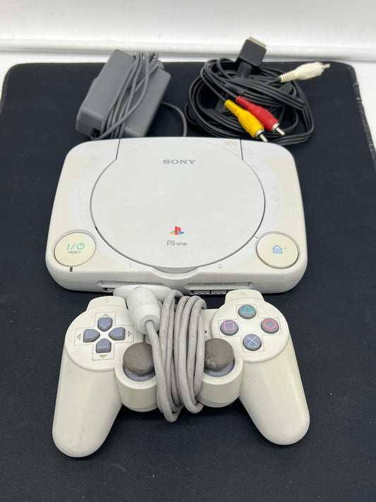 Auction Lot 1: Playstation 1 Console Tested Working With Cords and Controller