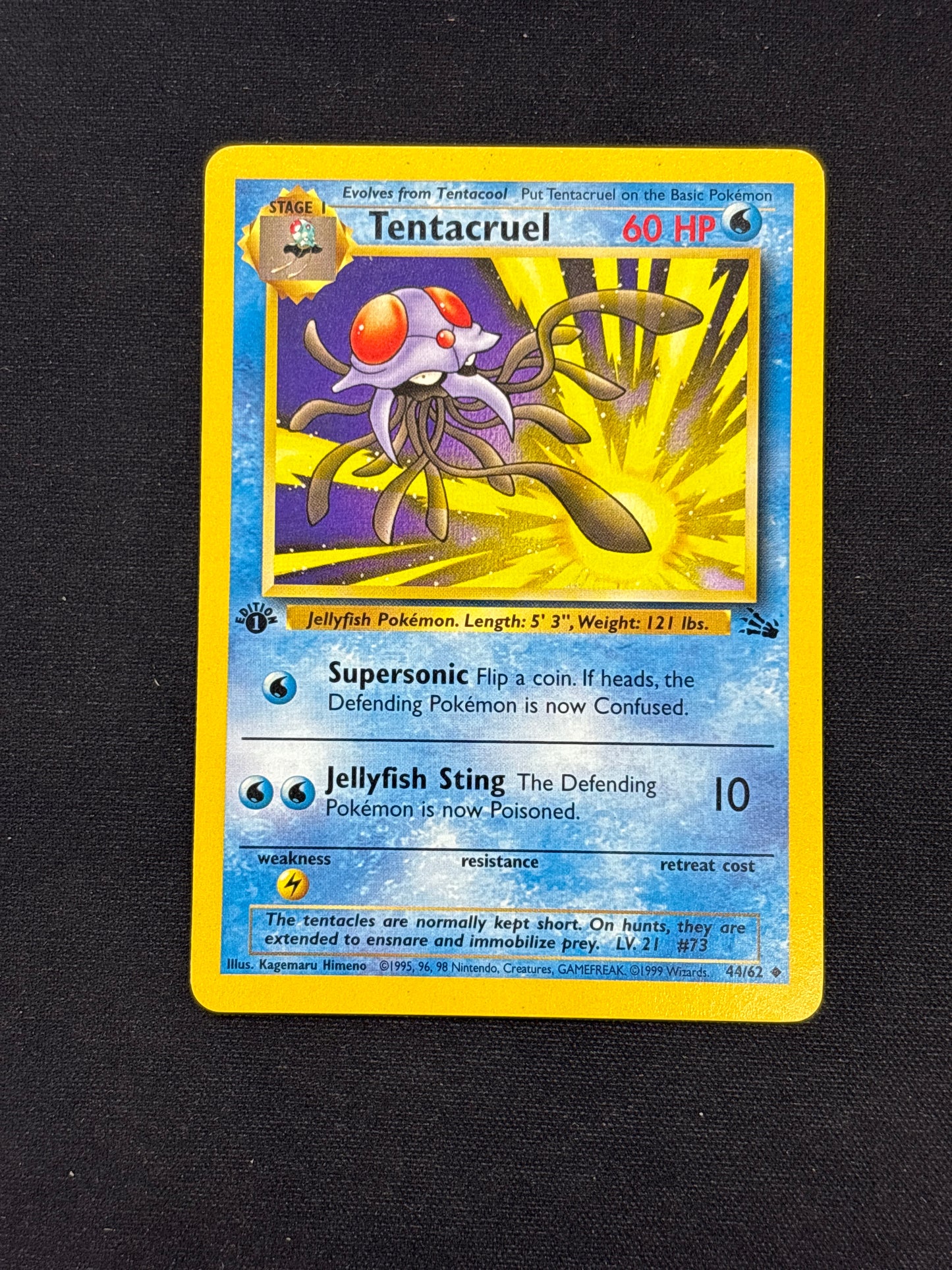Auction Lot 138: Pokemon Card Tentacruel 1st Edition Fossil Conditions Vary