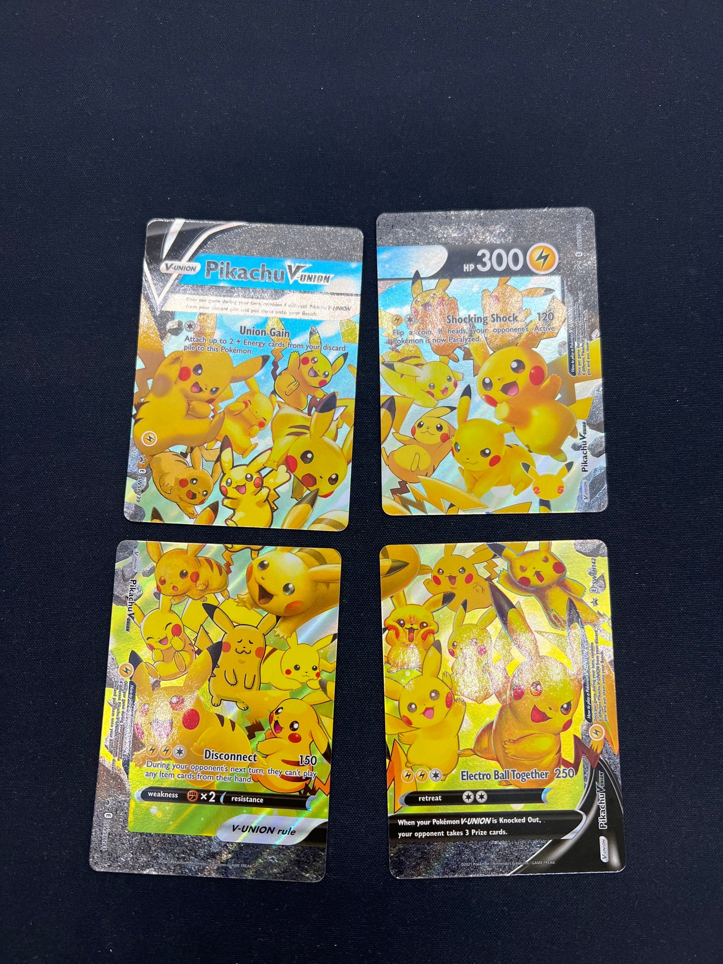 Auction Lot 131: Pokemon Cards Pikachu V-Union Full set Celebration Conditions Vary