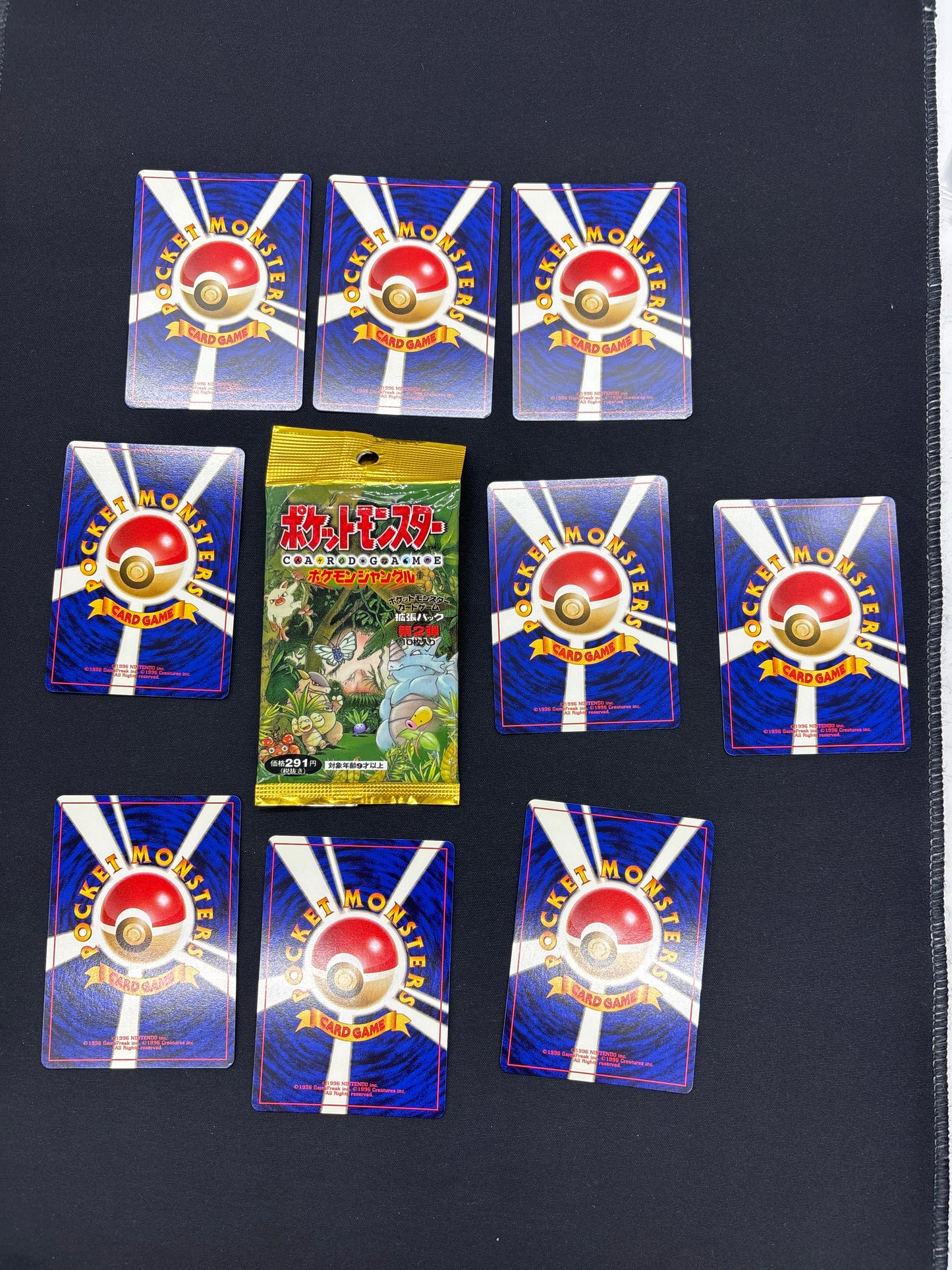 Auction Lot 18: Pokemon Japanese Jungle Set Card Lot Opened Pack