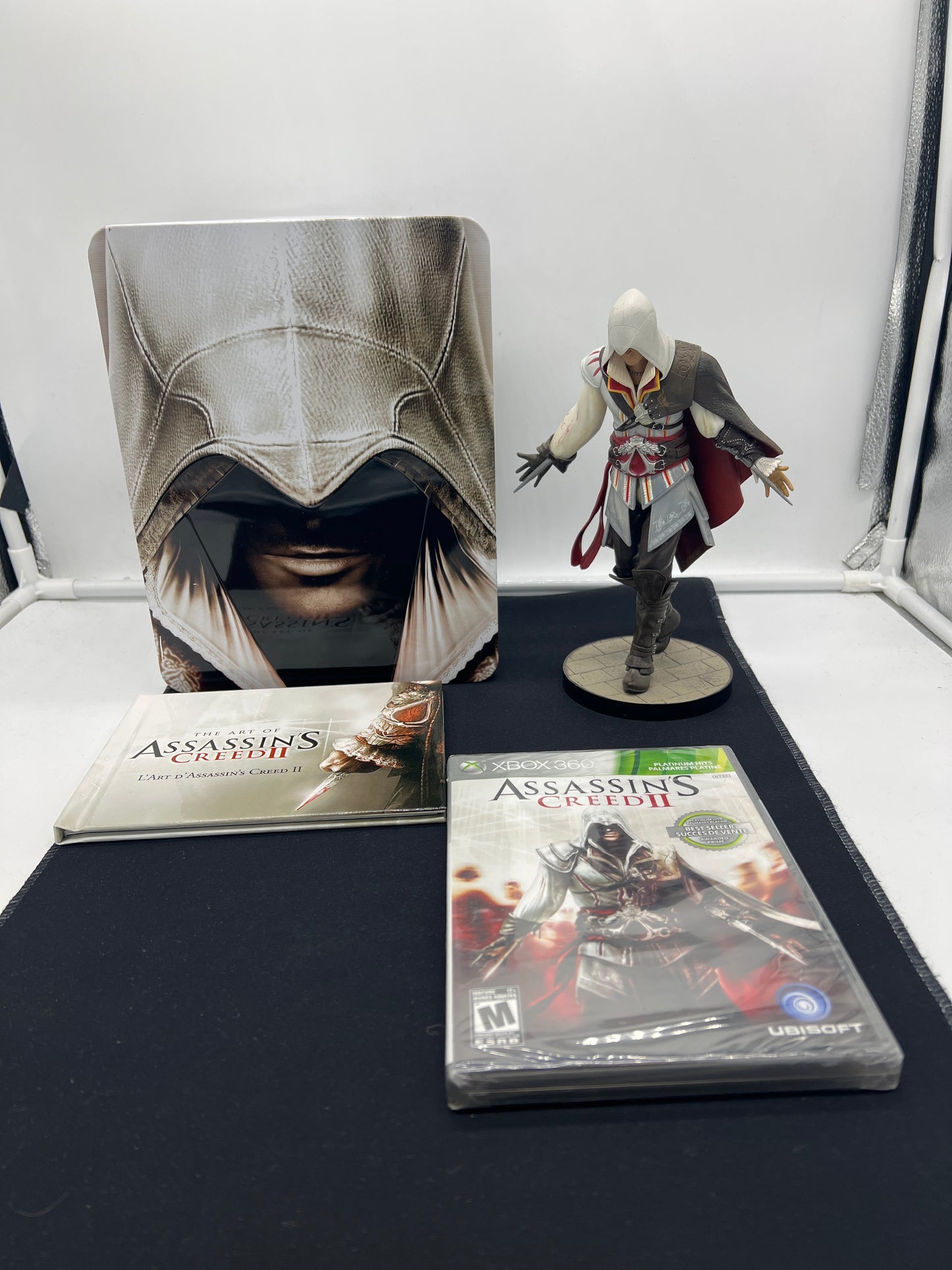 Auction Lot 109: XBOX 360 Video Game Assassin's Creed 2 Limited Edition With Figure Sealed Video Game With Contents