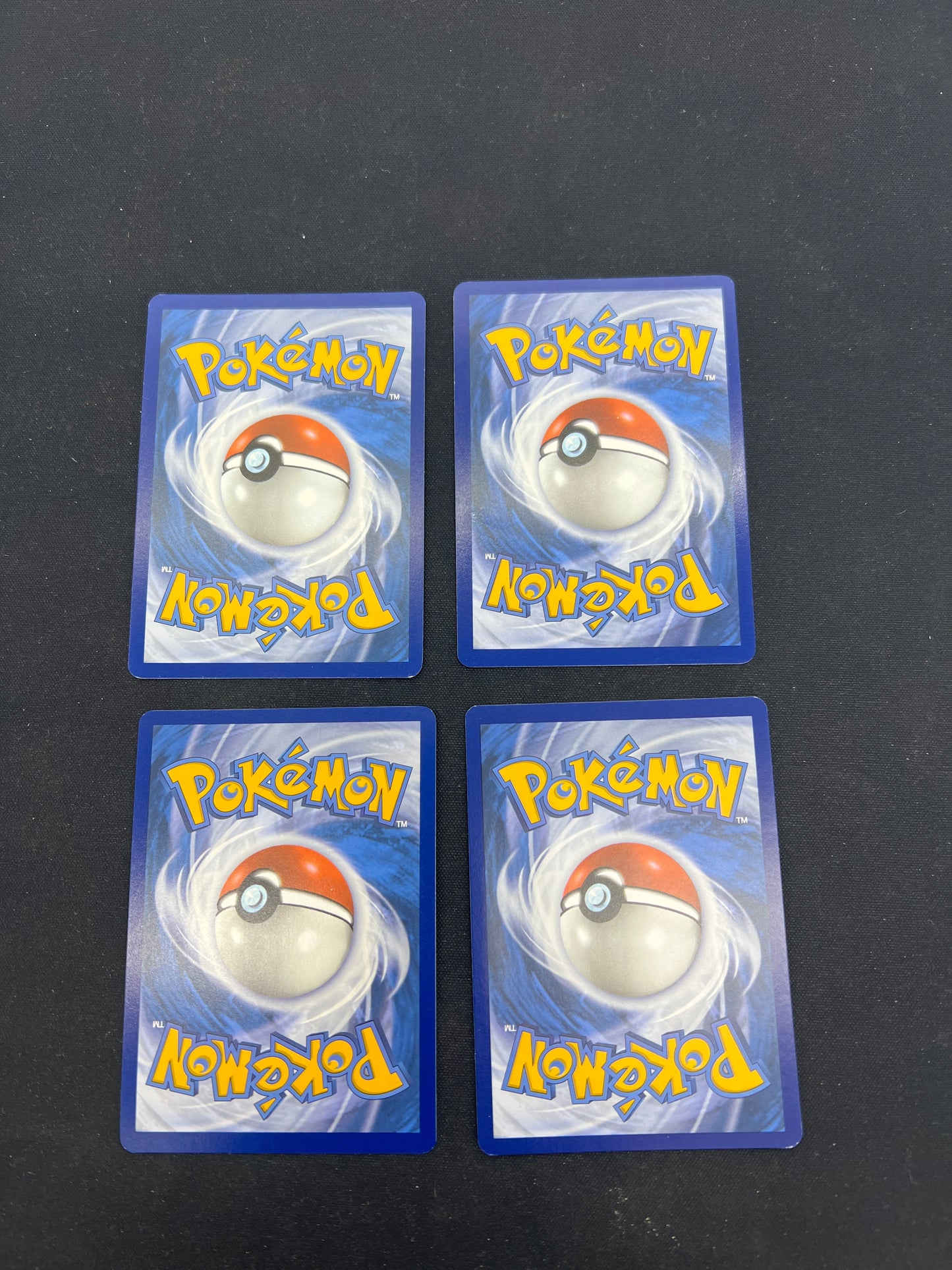 Auction Lot 352: Pokemon Cards Assorted Lot of 4 SV Era Cosmo Holos Lot Condition Vary