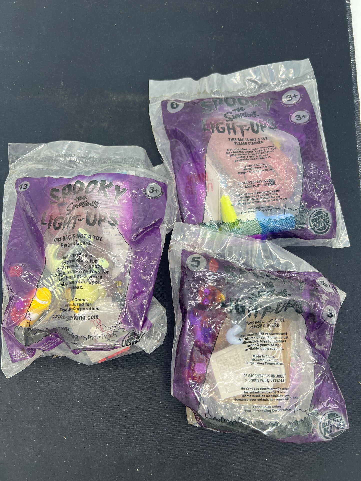Auction Lot 71: Simpsons Spooky Light Up Burger King Kid's Meal Toys