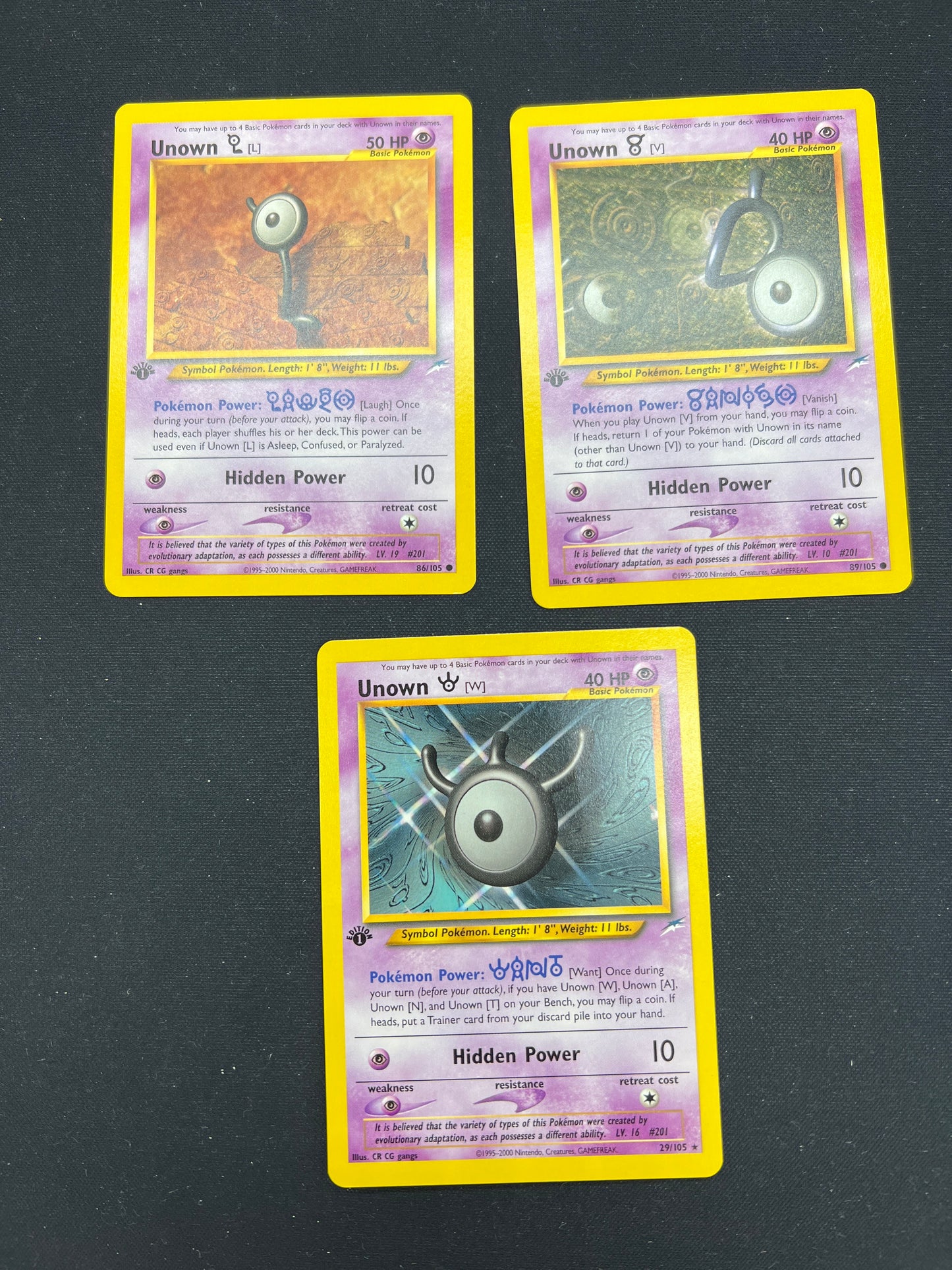 Auction Lot 24: Pokemon Cards Lot of 3 Unown 1st Edition Neo Discovery Conditions Vary