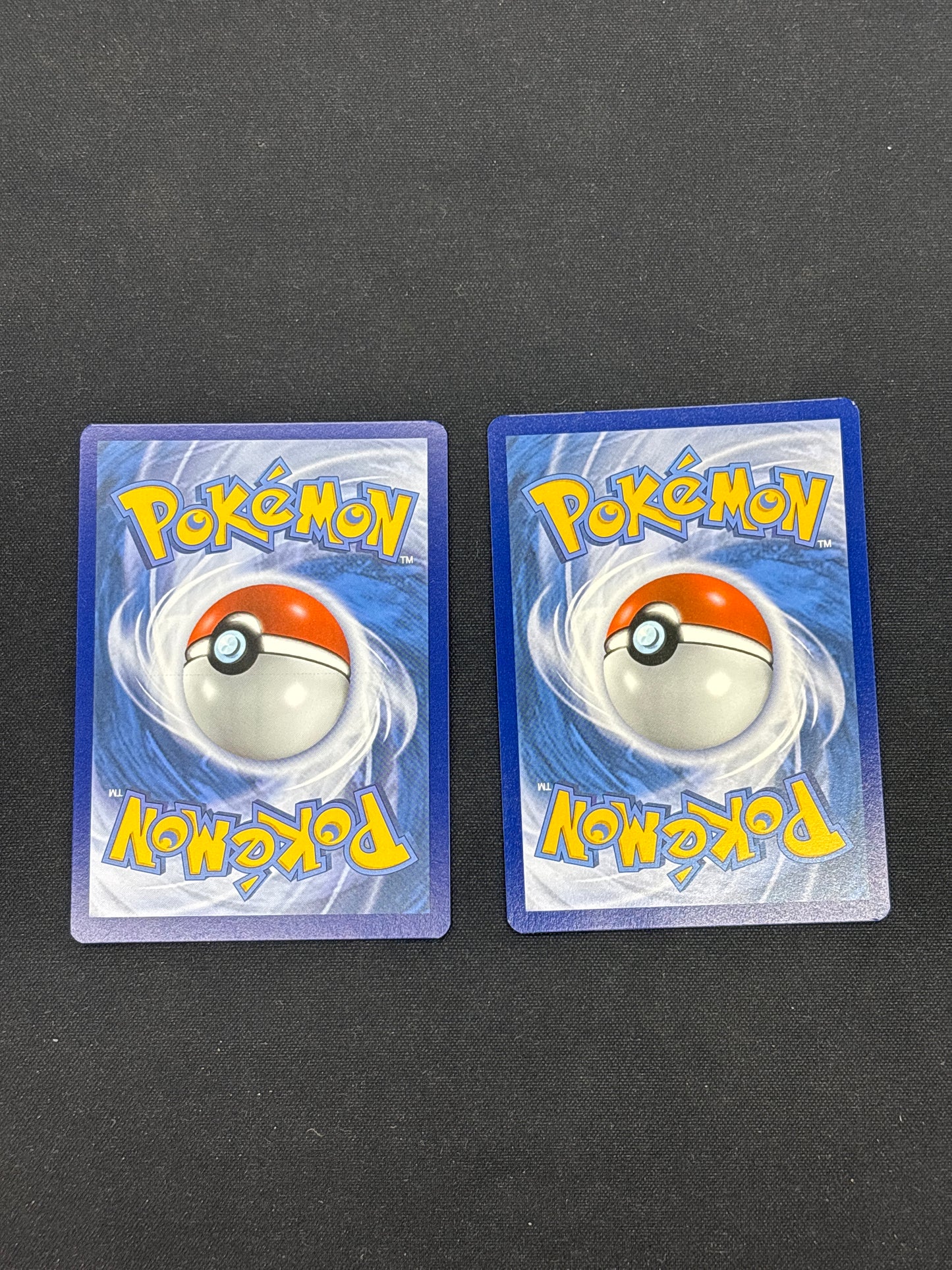 Auction Lot 57: Pokemon Cards Charmander & Pikachu Cosmo Holo Promo Stamped Pokemon GO Conditions Vary