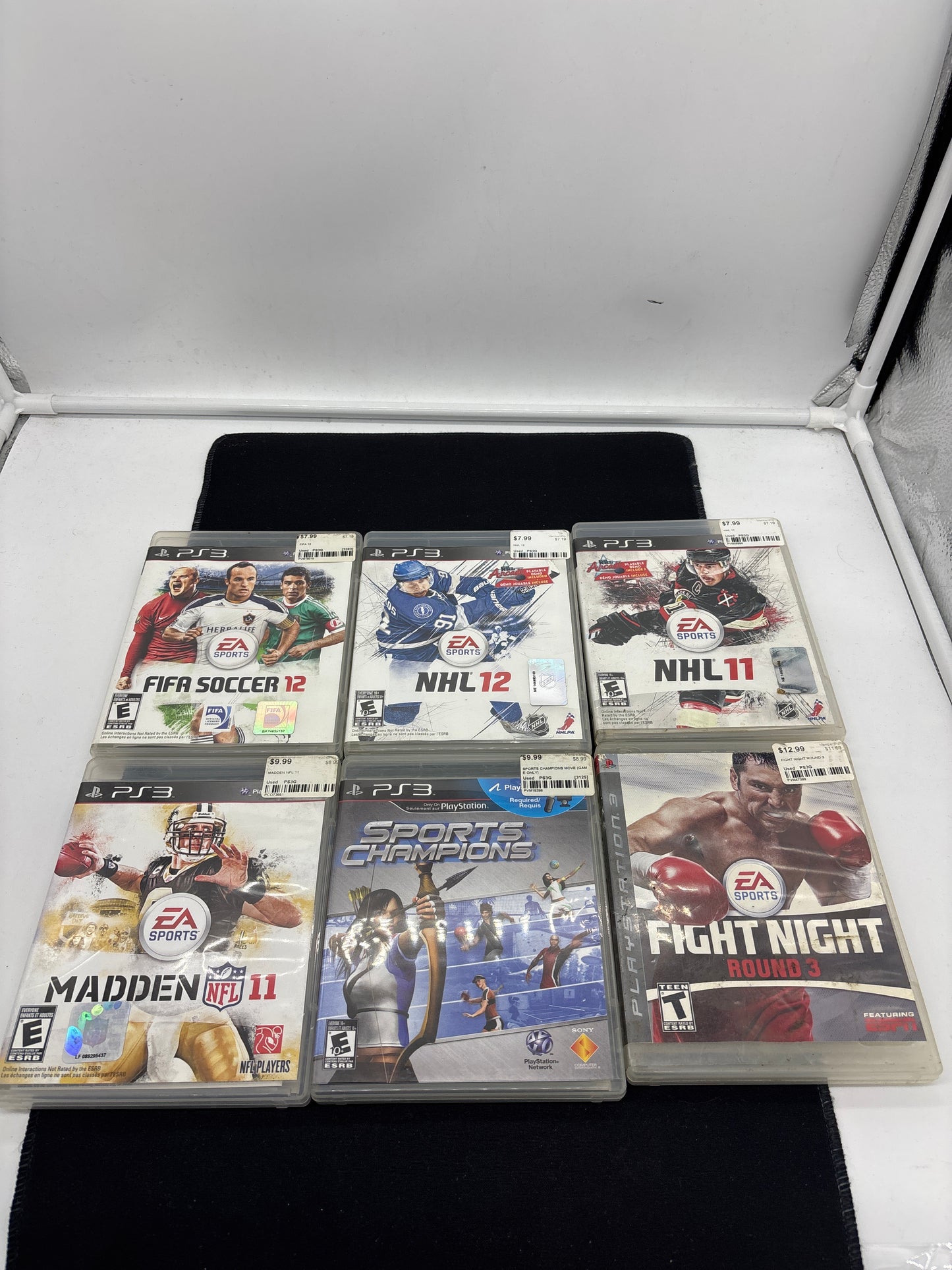 Auction Lot 86: PlayStation 3 Video Game Lot of 6 NHL 11 12 FIFA Soccer 12 Madden 11 Fight Night Round 3 Sports Champions