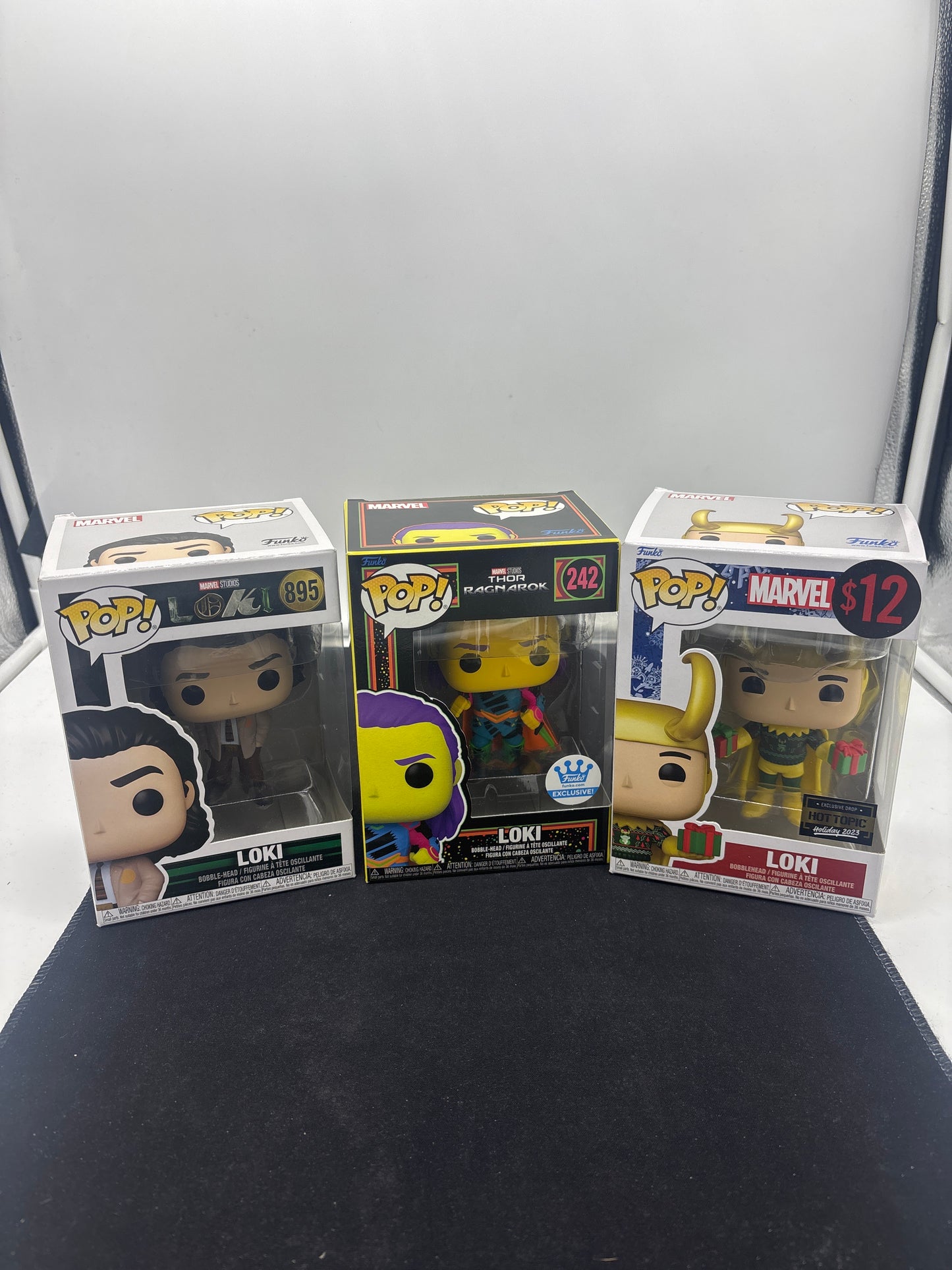 Auction Lot 35: POP Funko Exclusives Loki Lot of 3 1132 895 242 Figures