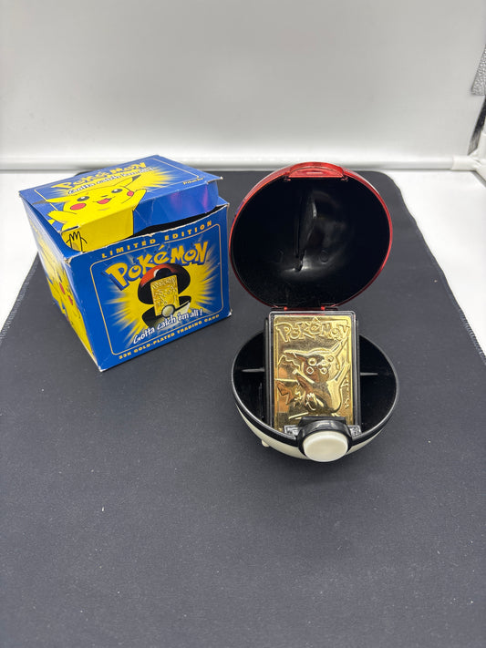 Auction Lot 32: Pokemon 23K Gold Plated Pikachu With Box and Pokeball Holder