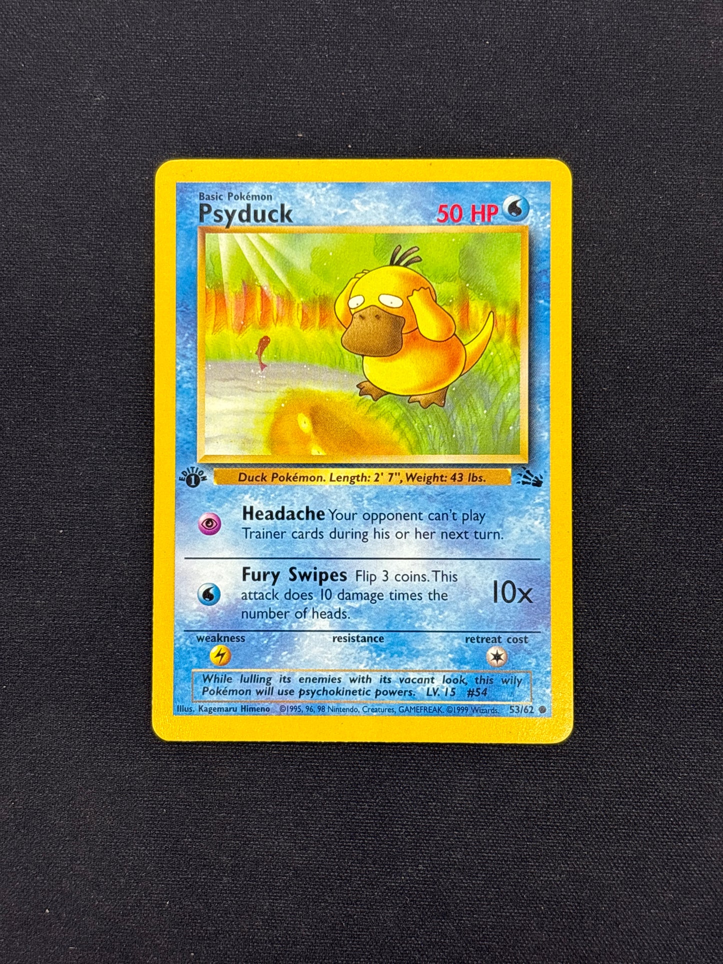 Auction Lot 409: Pokemon Card Psyduck 1st Edition Fossil Conditions Vary