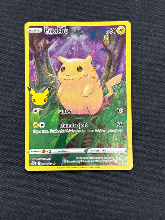 Auction Lot 36: Pikachu Celebrations Full Art Holo Card Conditions Vary