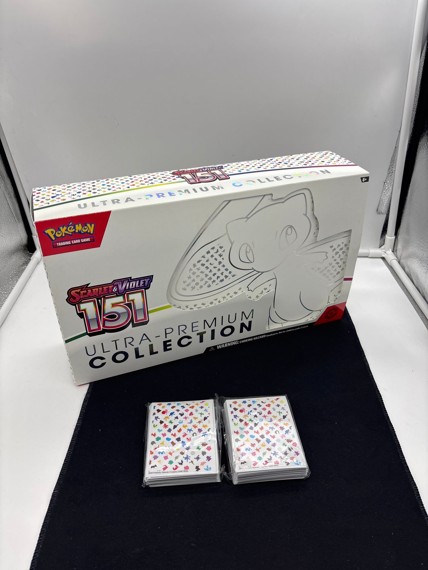 Auction Lot 106: Pokemon 151 UPC Empty With ETB Card Sleeves