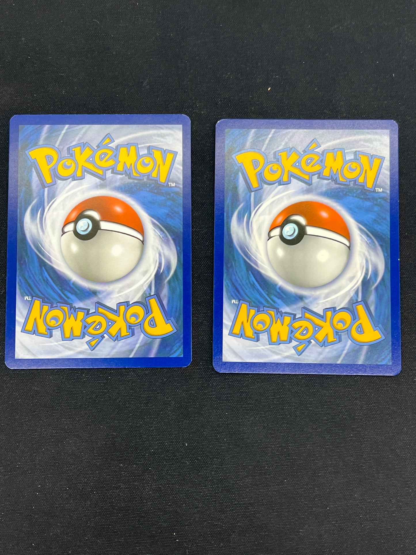 Auction Lot 390: Pokemon Cards Team Up Lot of 2 Non Holo Rare and Cosmo Holo Charizard 14/181 Conditions Vary